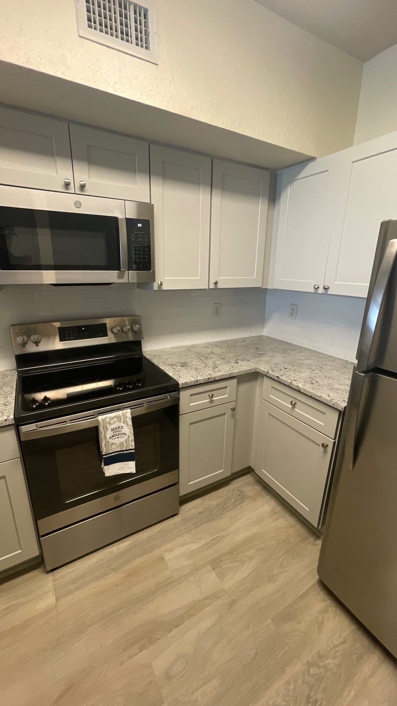 Home Remodel using LVP Flooring and Cabinets by HandyMangum