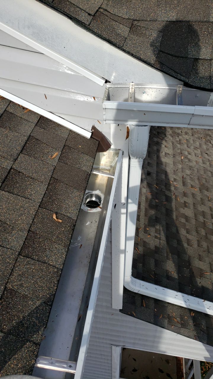 Gutter Cleaning using water by Power Wash Masters LLC