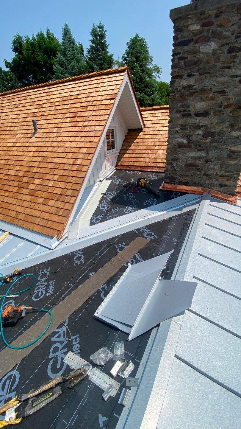Cedar Shake Roof Replacement with Half Round Gutter Installation by Custom Installations