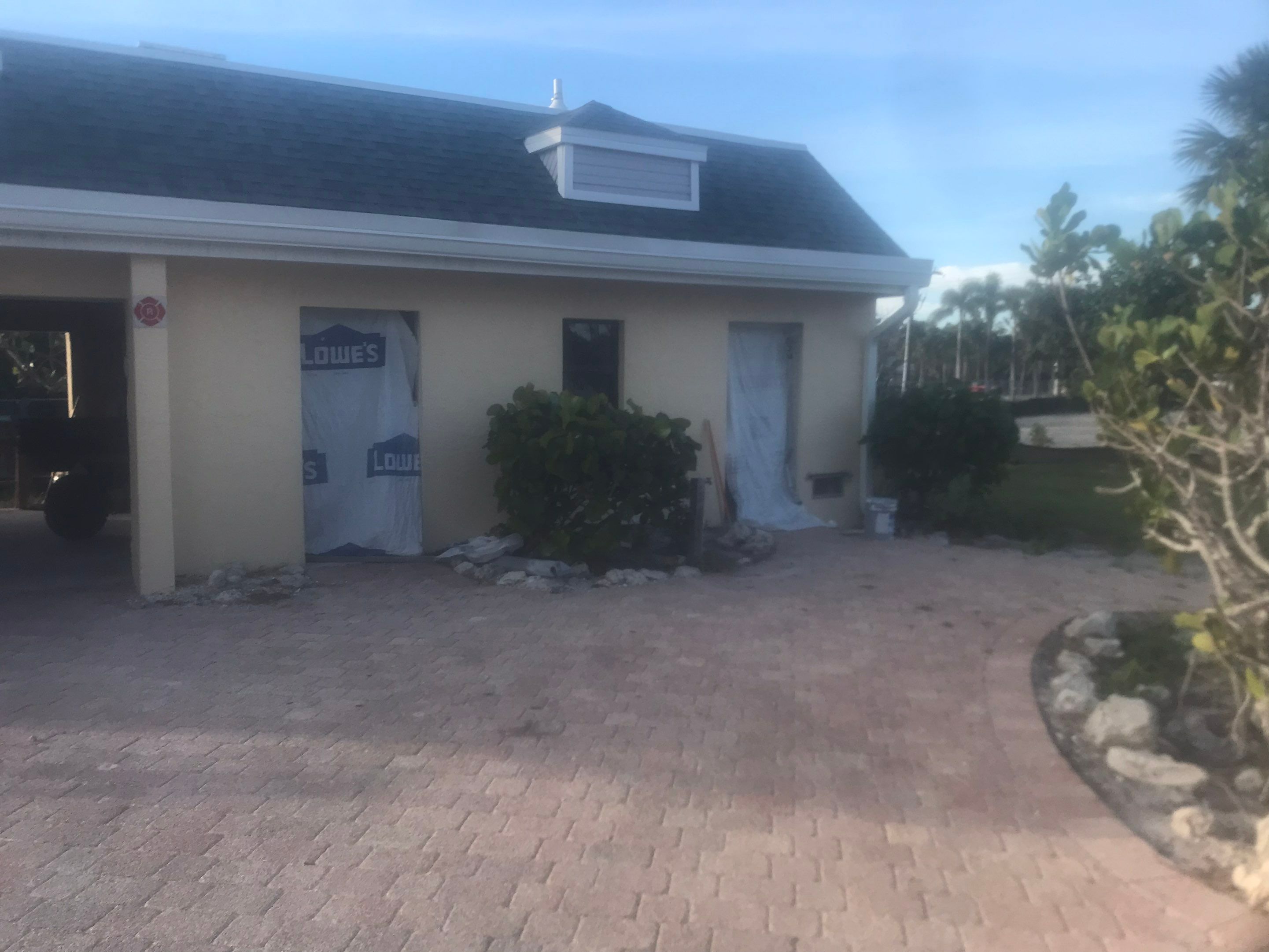 K-Style Seamless Gutter Installation using White Seamless Gutters in Sanibel FL by Gutter Professors