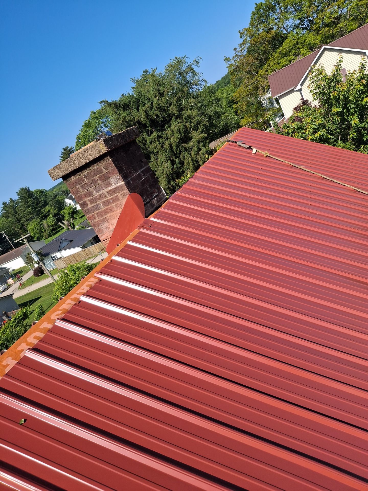 Residential Roofing Installation using Metal by Rainstoppers Roofing