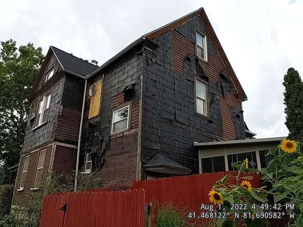 Fire damaged home in Tremont by Absolute Roofing and Construction