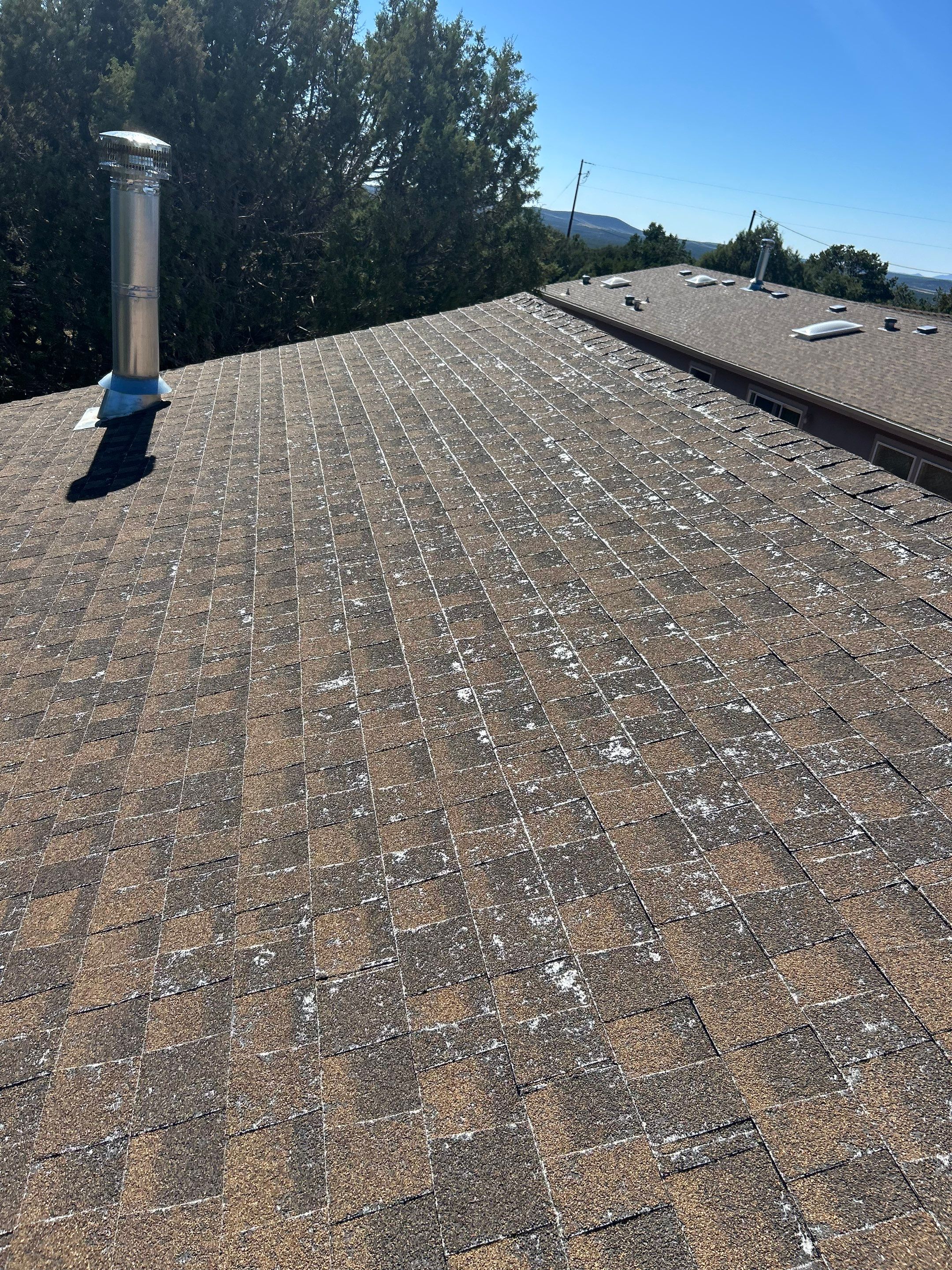 Mission Brown Shingles by Reimagine Roofing