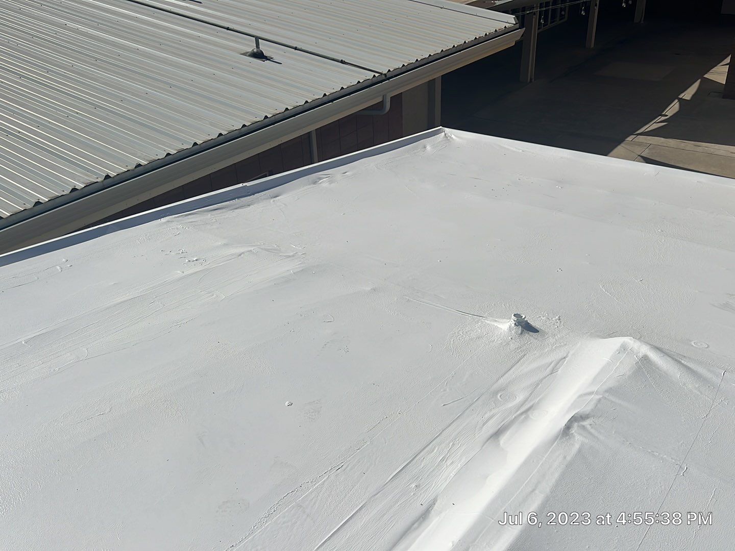 MR Roofing system using Benchmark/PUMA XL coatings over TPO single-ply roofing by Straight Edge Roofing Inc