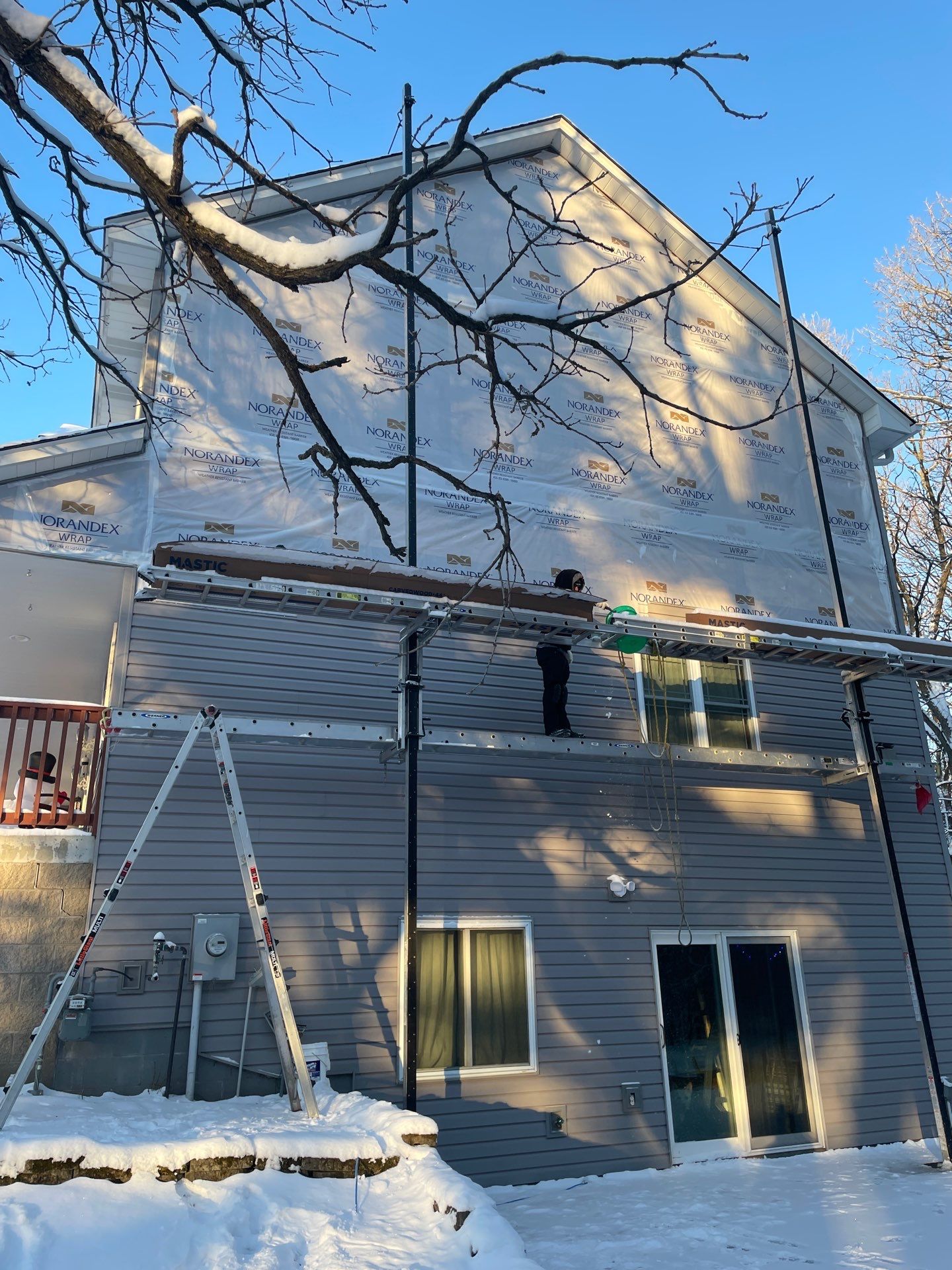 Roof & Siding Replacement – Oak Grove, MN | Insurance-Approved | Owens Corning Duration Midnight Plum & Mastic Carvedwood Harbor Grey by First Impressions Exteriors
