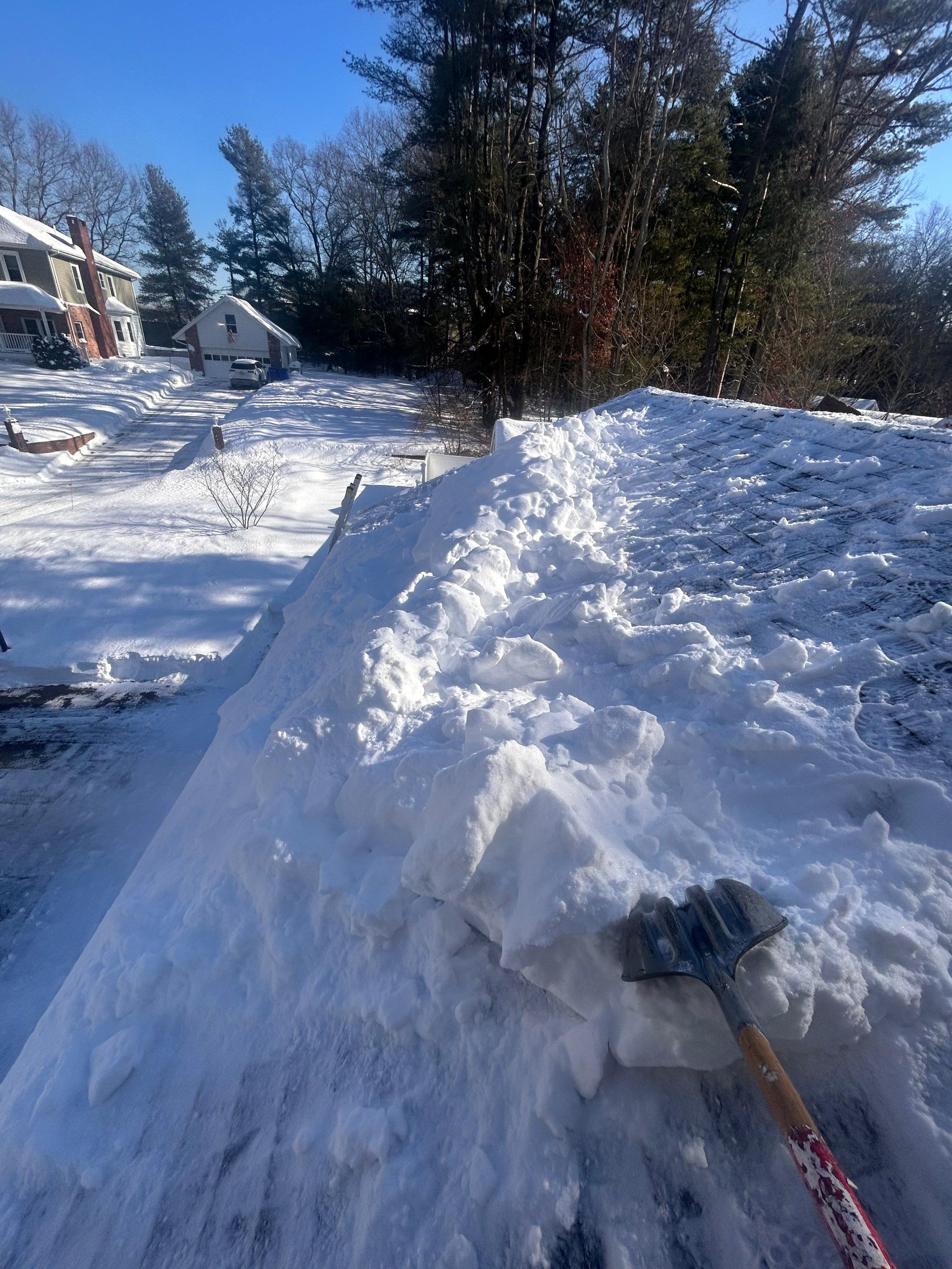 Ice dam & Snow removal by Mighty Dog Roofing of Greater Middlesex County