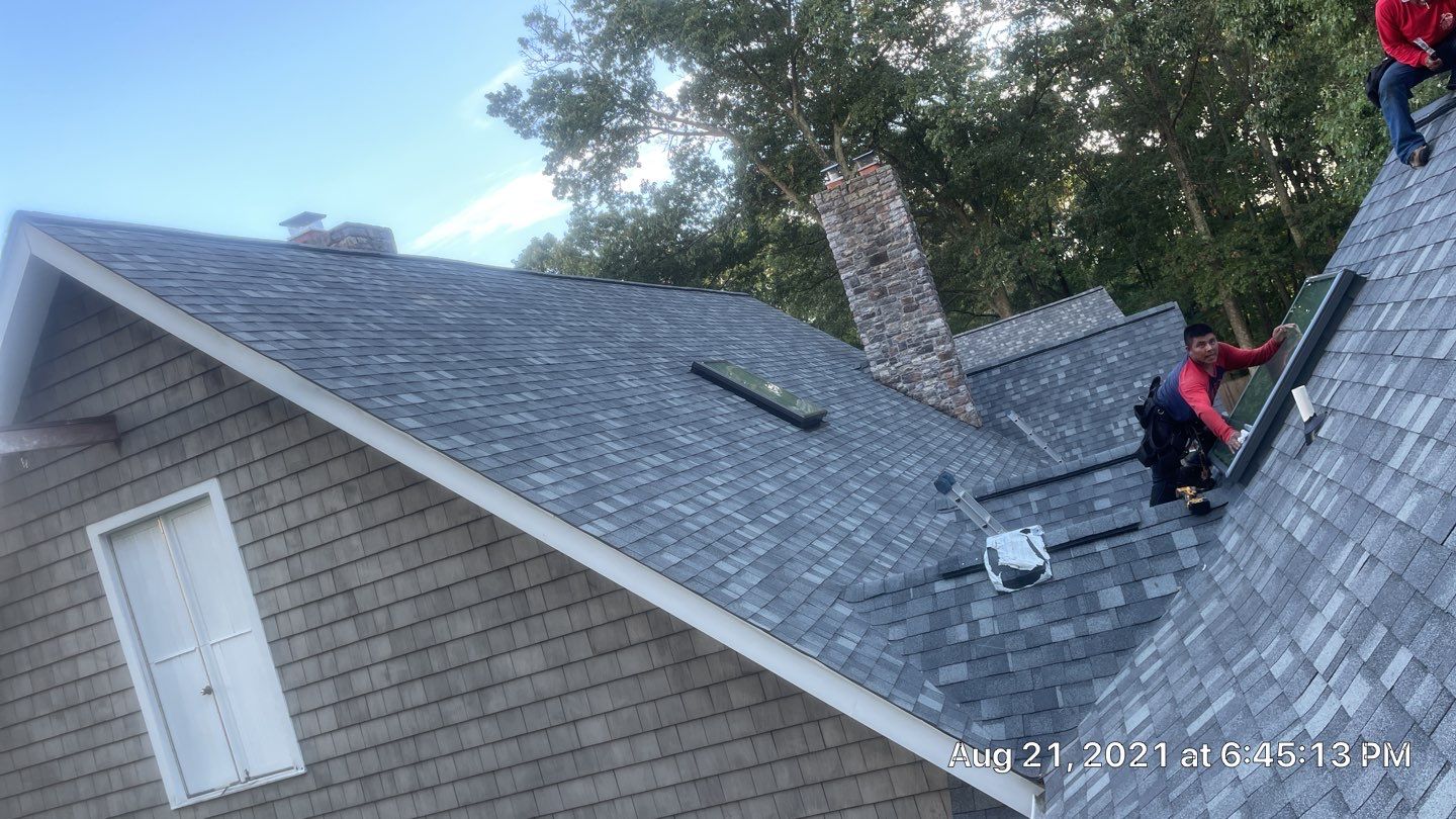 Roof Replacement using IKO Dynasty by American Home Contractors