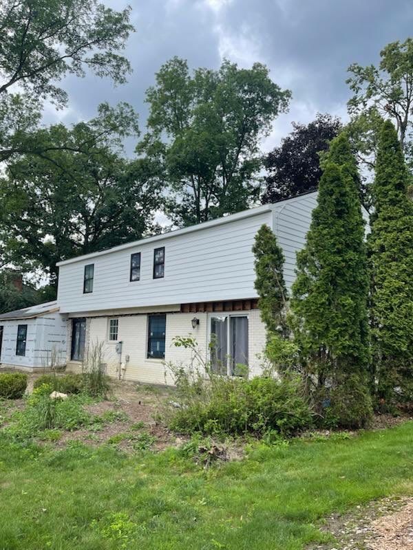 Siding Replacement using Hardie Plank S8 1/4"  Arctic White by 180 Contractors