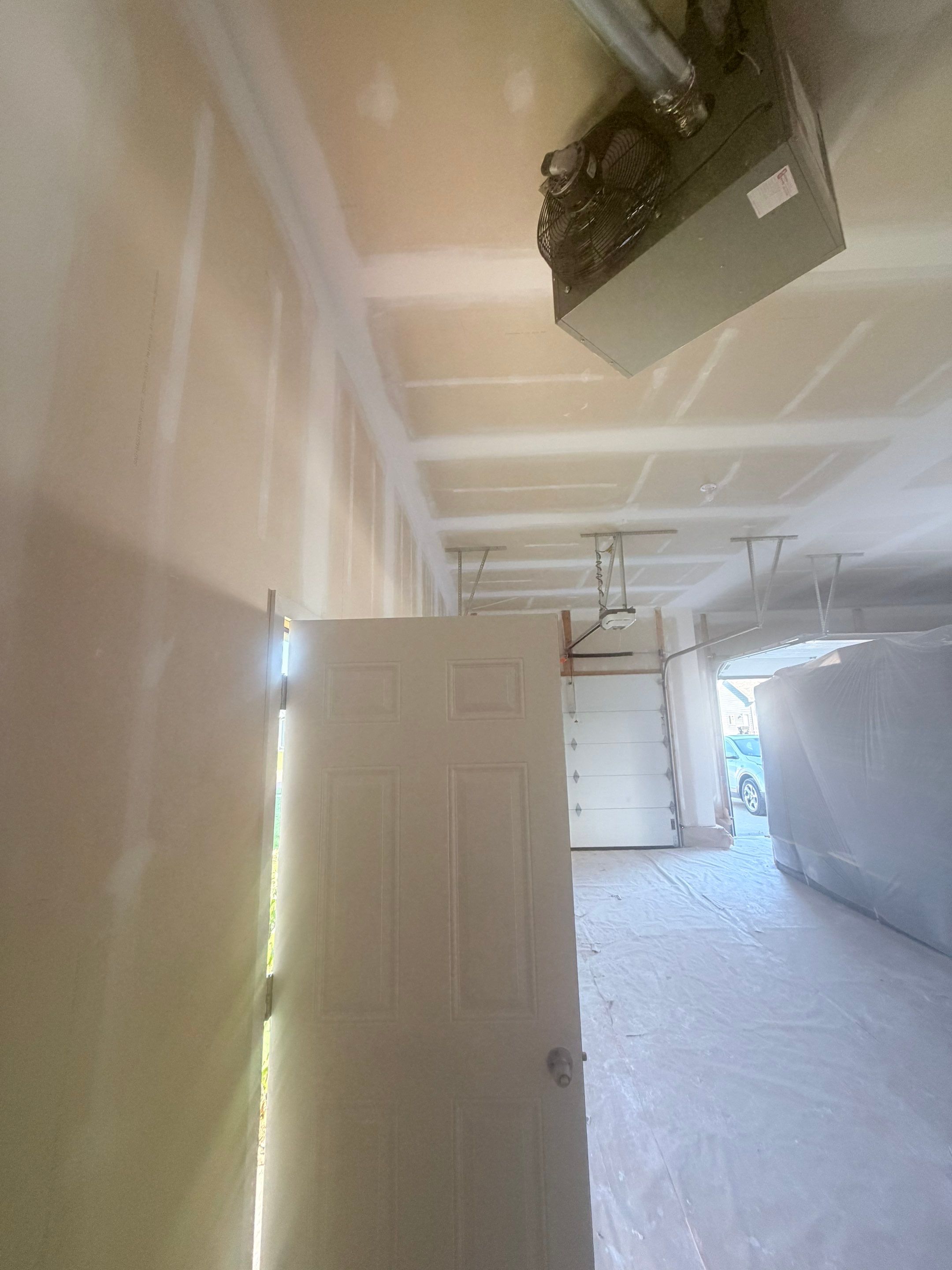 Full Garage Interior Drywall Finishing and Priming in Sioux Falls by Select Painting, Coatings & Garage Cabinets