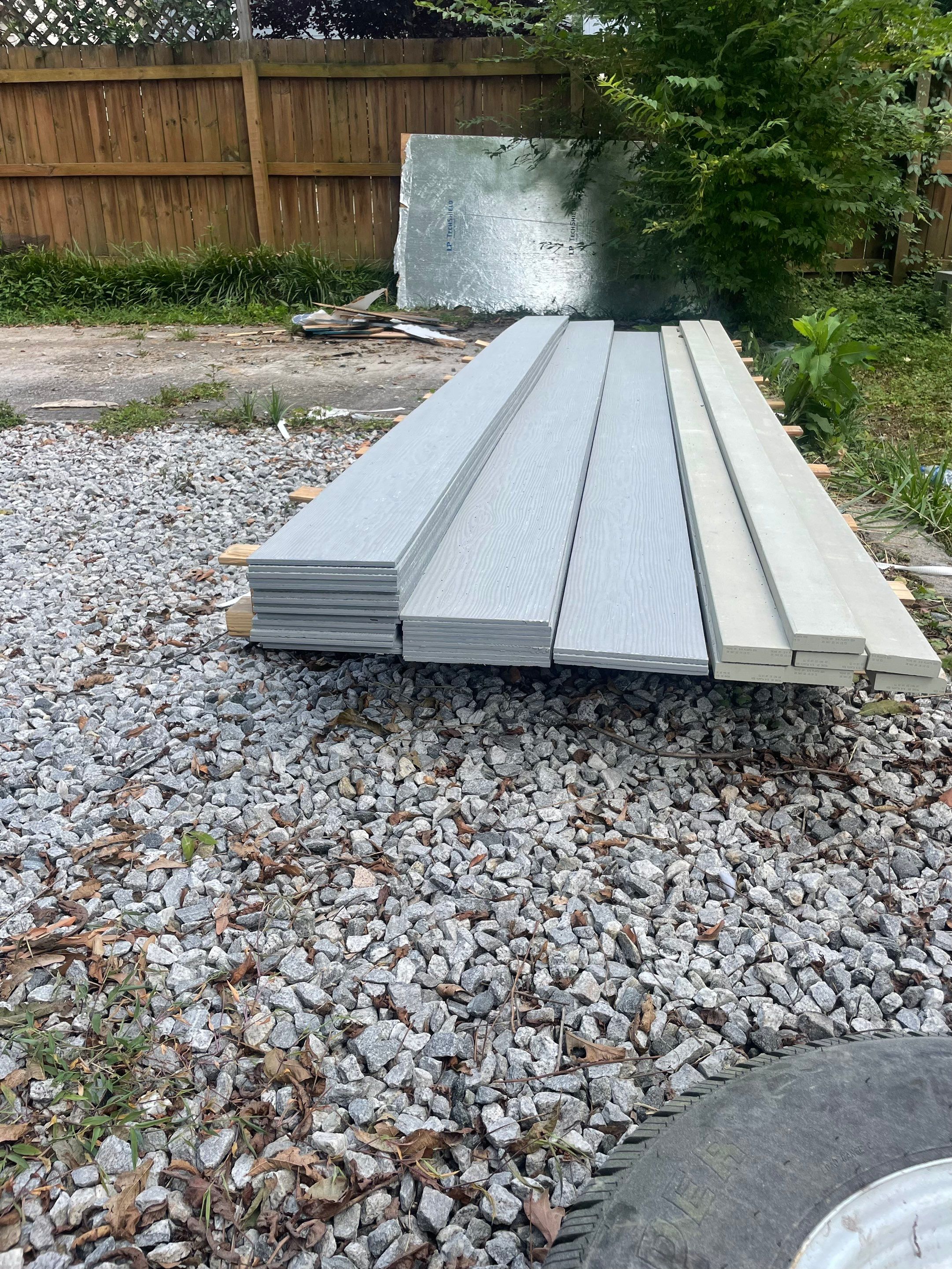 tiny home remodel- siding,paint,roofing by Nailed It Roofing & Remodeling LLC