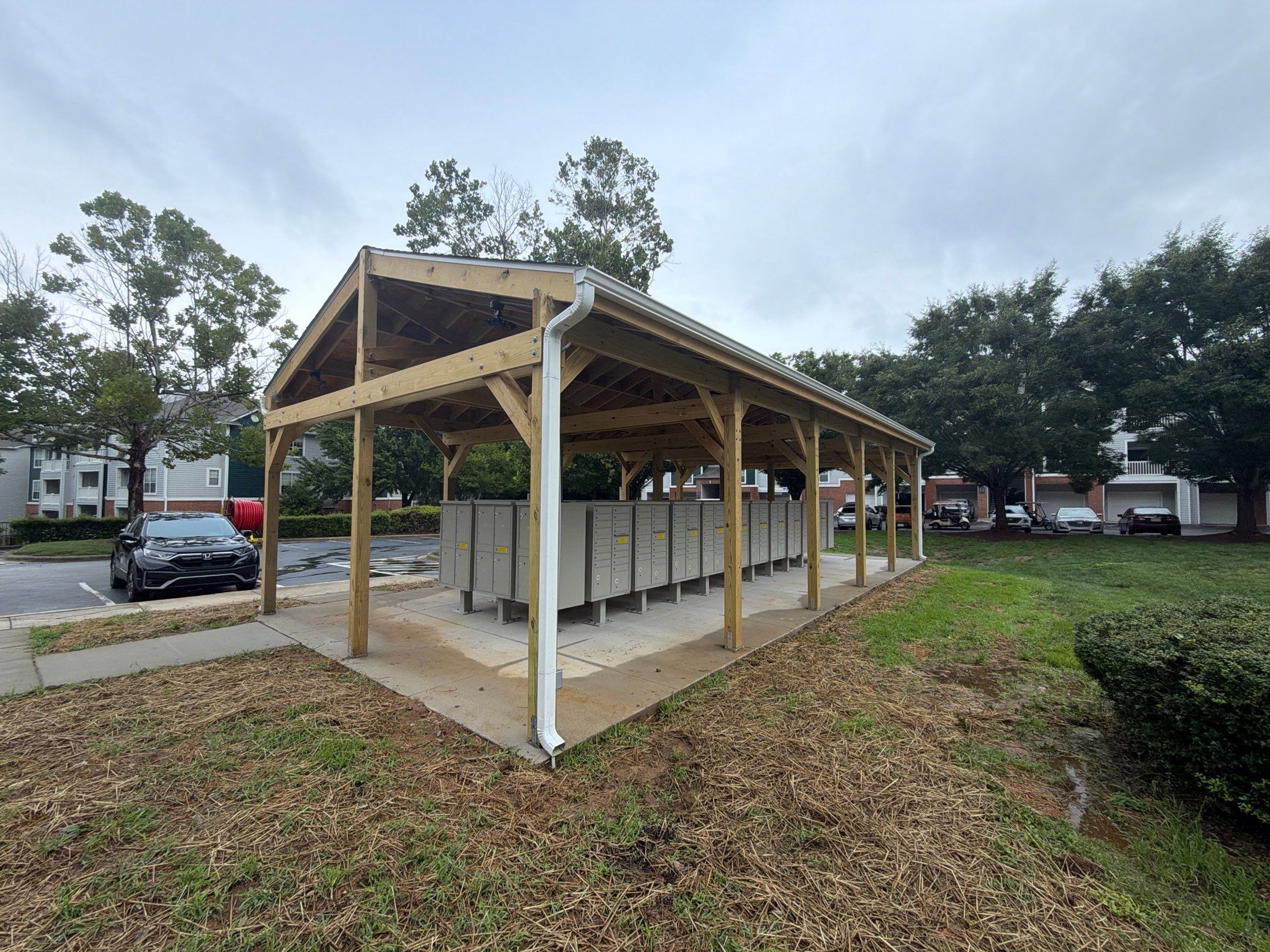 Custom Timber Frame Pavilion for Cluster Mailbox Units in Raleigh by Billy Weatherspoon Contractor