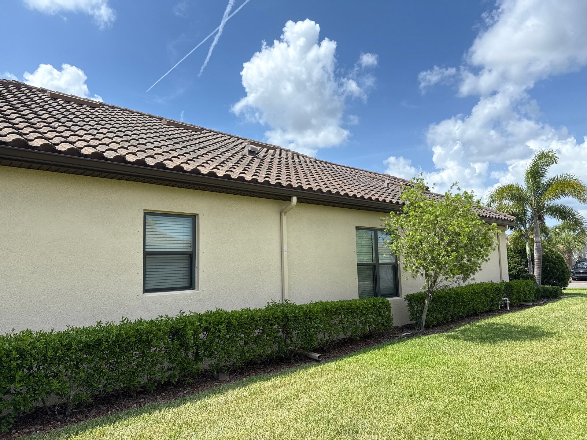 Concrete Tile Roof, Paver Driveway & Lanai Cleaning – Artisan Lakes Esplanade, Palmetto, FL by Sunshine AquaWash