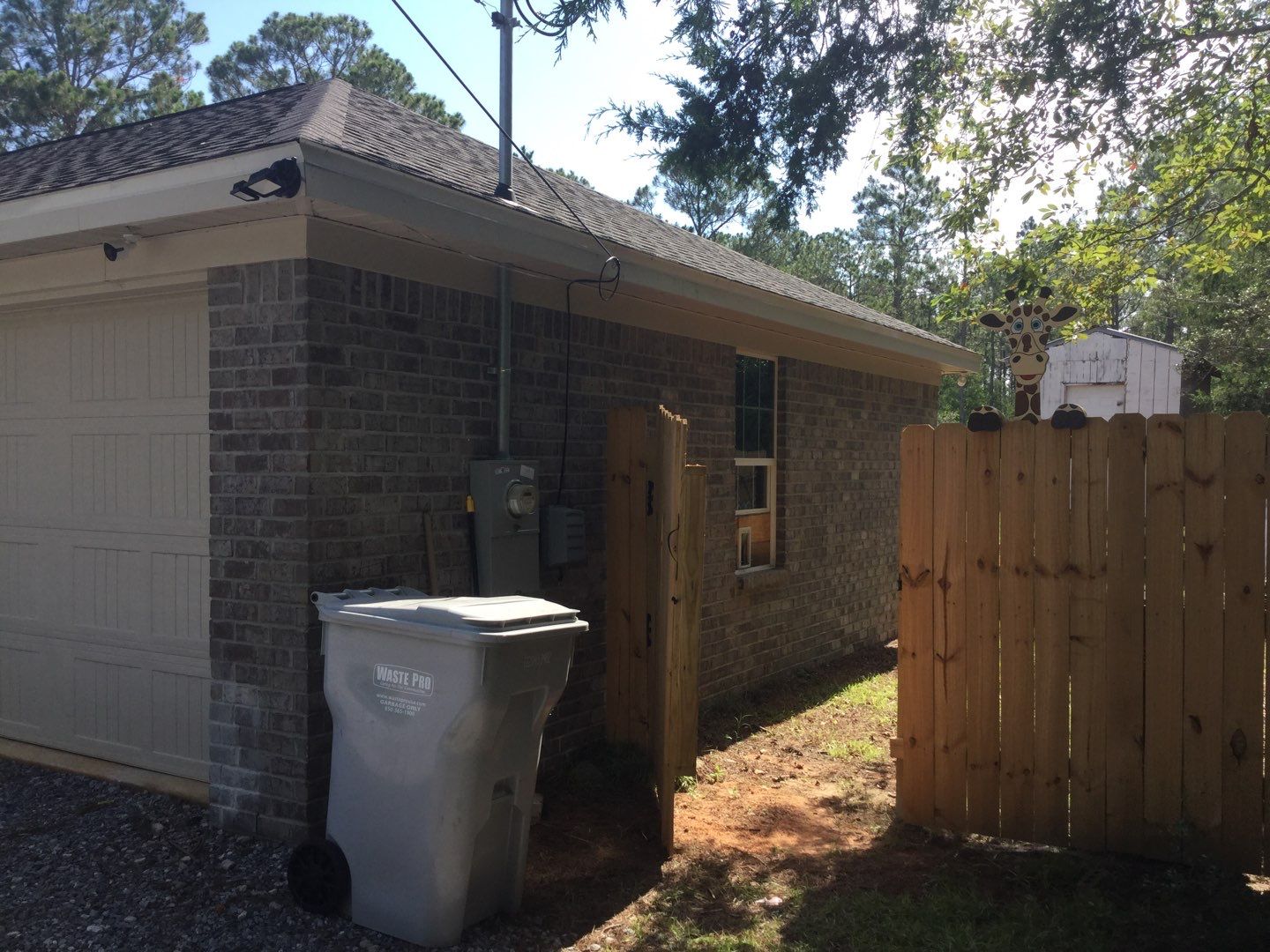 Downspout Installation using White Down Spouts in Milton FL by Gutter Professors