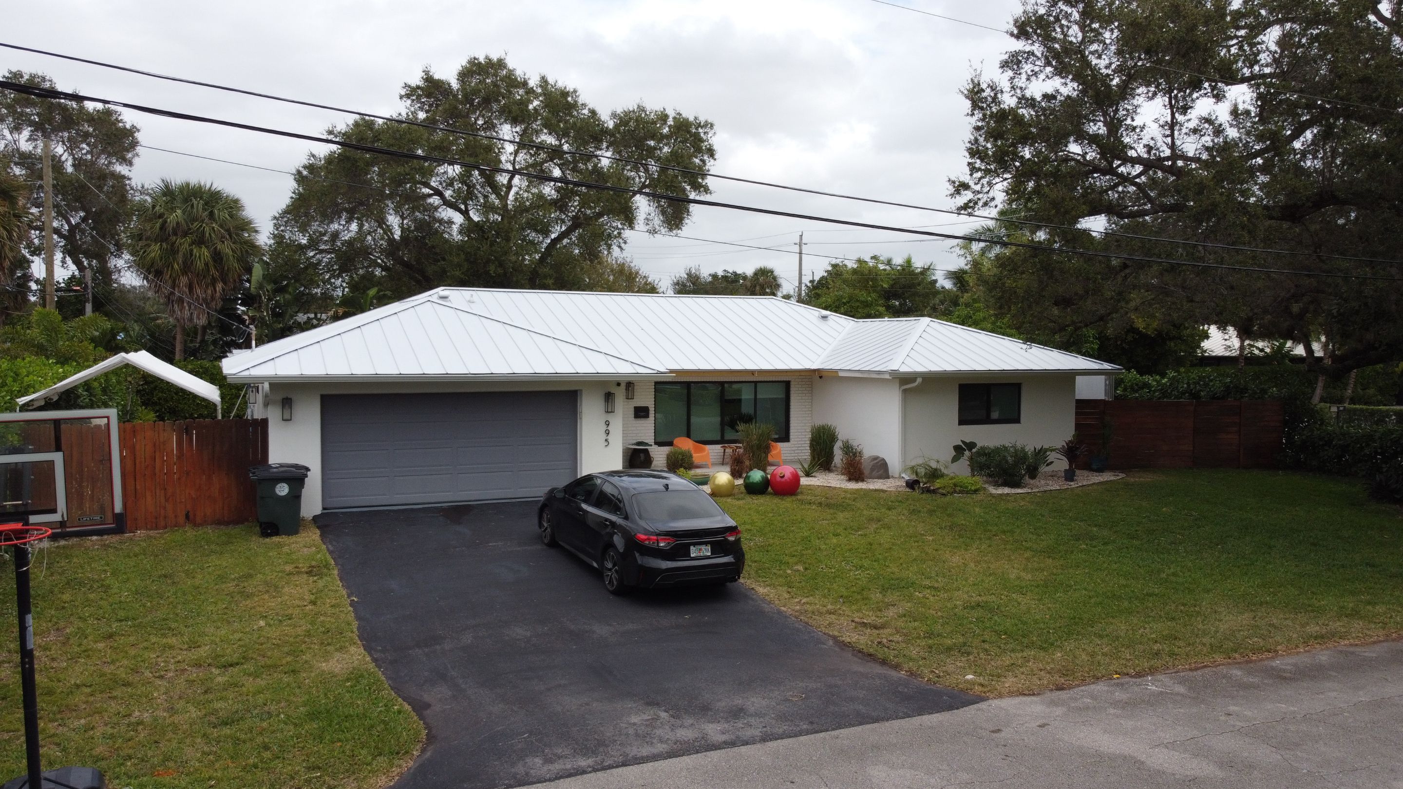 Residential Roofing Installation using 1" Nail strip metal roof by BLUES BROTHERS ROOFING