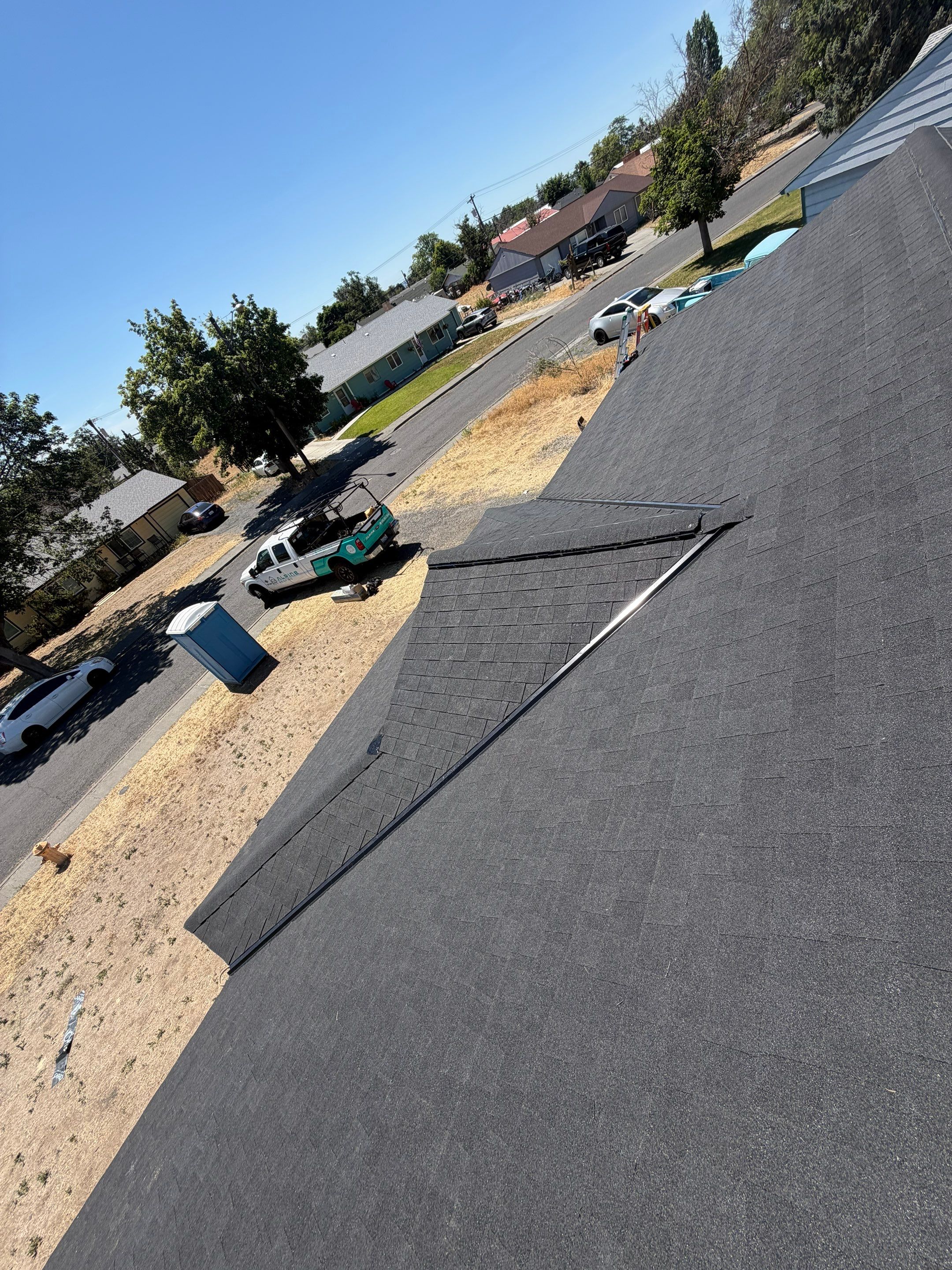 Complete Residential Roof Replacement and Sheathing Repair in Pershing Rd Moses Lake, WA 98837 The Denali System - Certainteed Landmark® Shingle - Cinder Black by Alpine Roofing