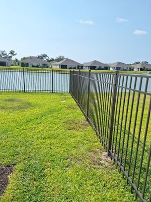 Aluminum Fence Installation using Black 3 Rail Aluminum Fence