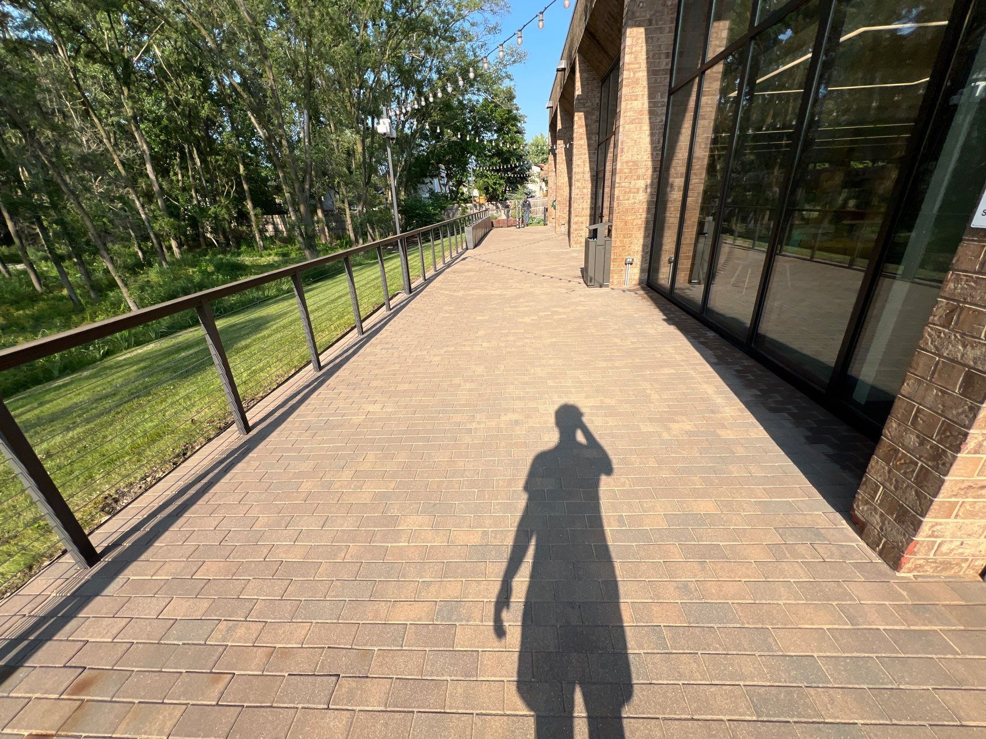 Brick paver repair, cleaning, sealing and poly sanding by Northern Power Washing LLC.