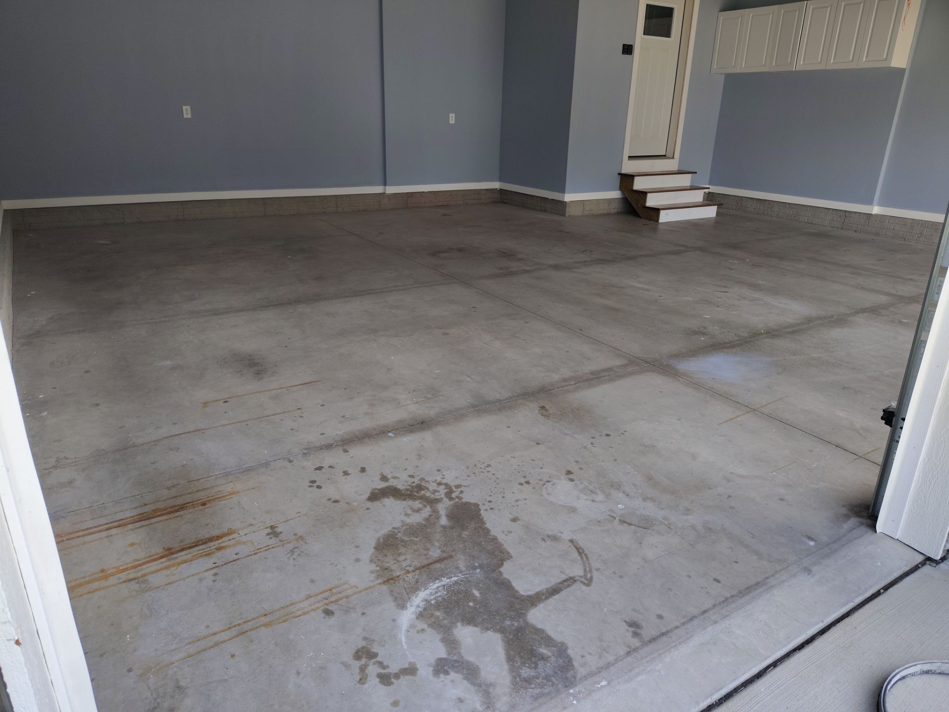 Tidal Wave Garage Transformation in Adel, Iowa by Revival Concrete Coatings
