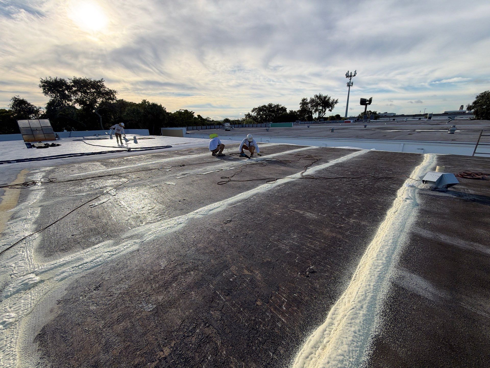 Fort Lauderdale Commercial Roof Restoration with Spray Foam and Silicone Coating by Roof King LLC