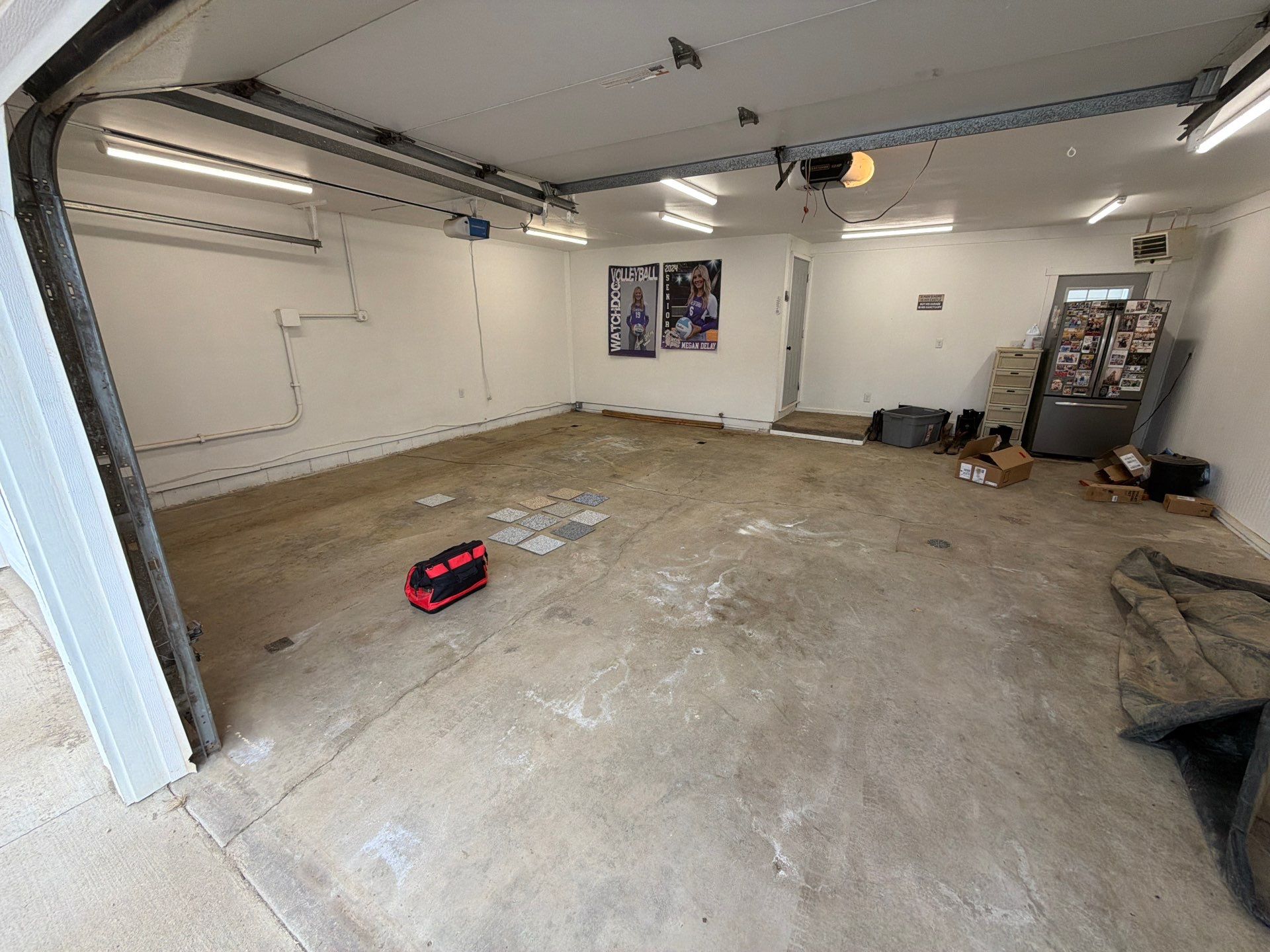Feather Grey Garage Floor Coating and Crack Repair in Beresford by Select Painting, Coatings & Garage Cabinets