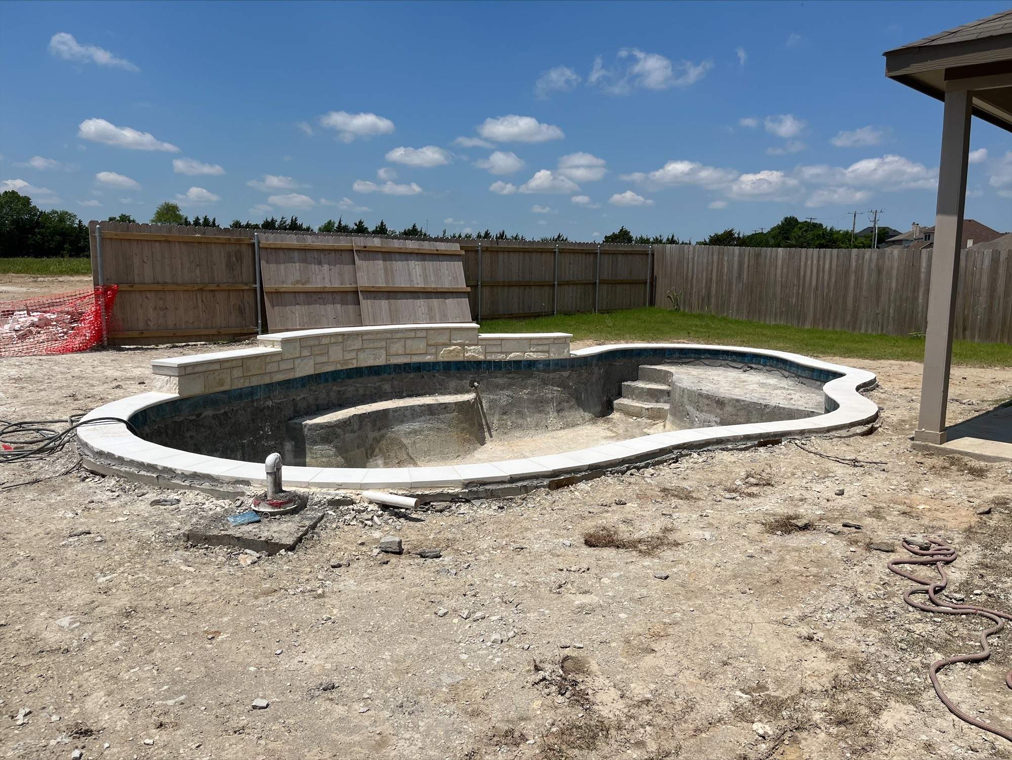 Freeform Pool with Tanning Ledge by Pinnacle Pools and Spas - DFW