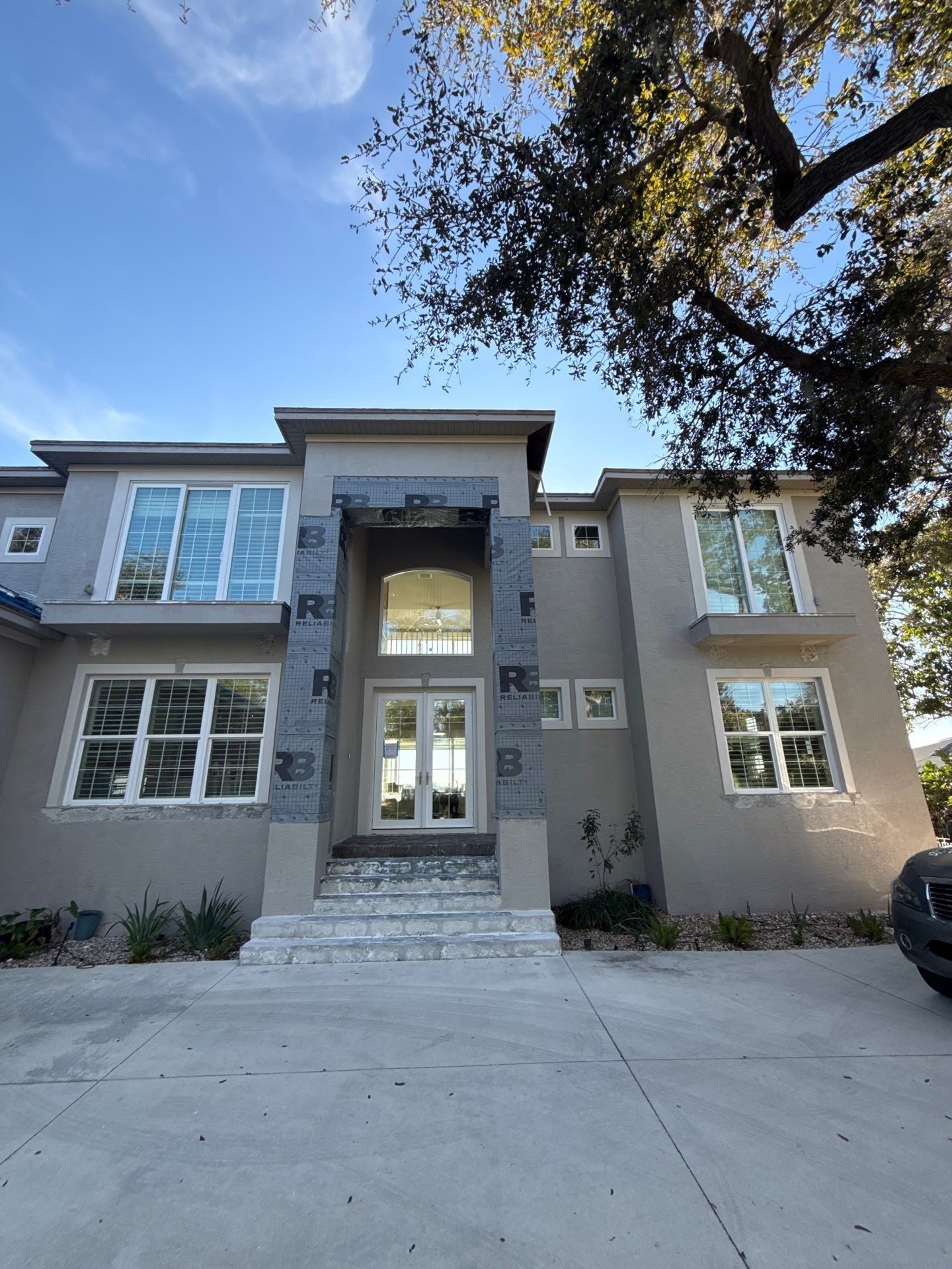 Soffit and Fascia Installation and black seamless gutters in Sarasota FL by Gutter Professors