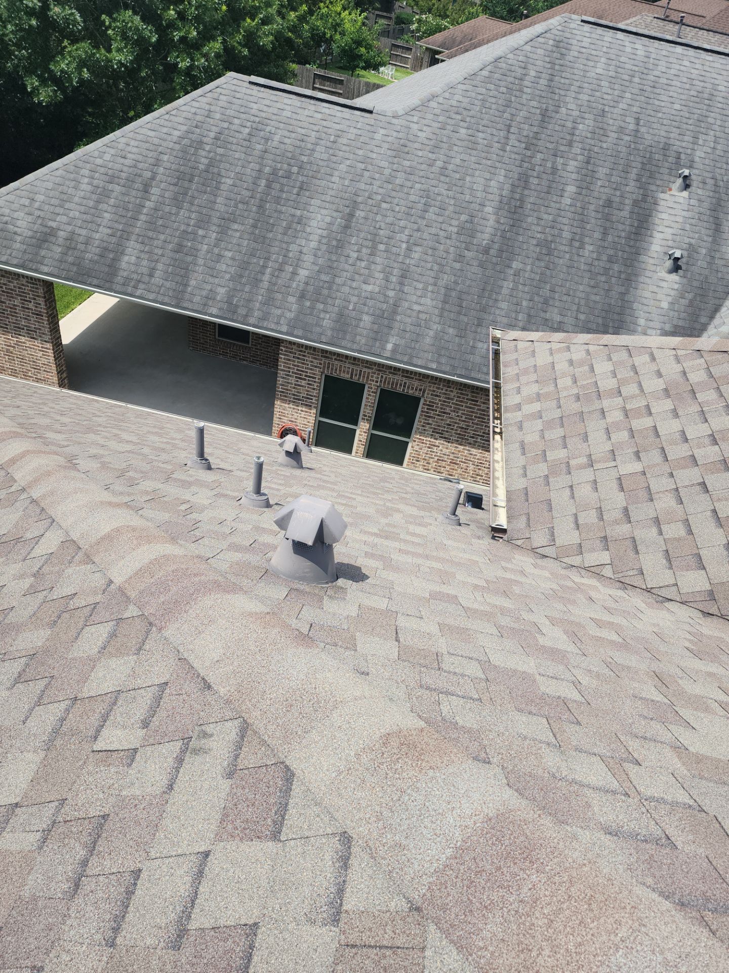 Hail Damage using Owen's Corning Duration (Lifetime) Shingles by Roof Repair Company