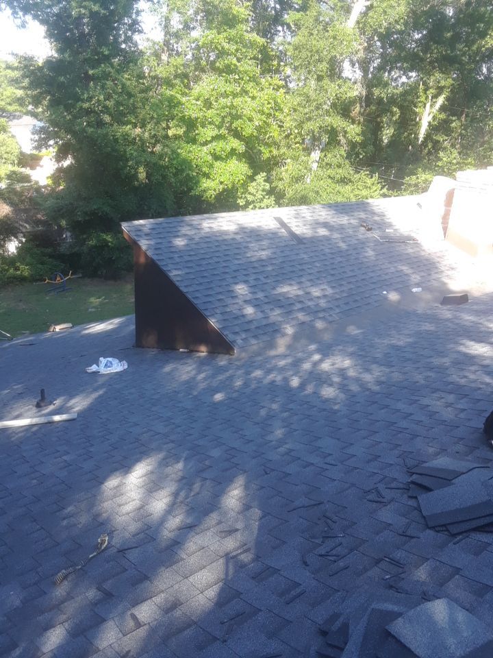 Commercial Roofing Installation using Roof Replacement by American Roofing & Construction LLC