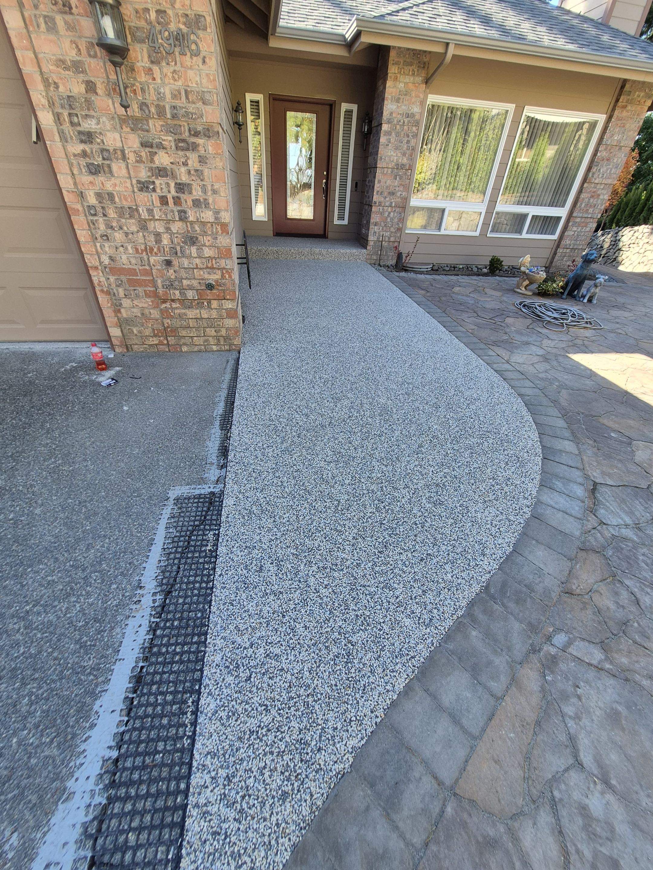 Stylish Walkway and Patio in Tennessee Vuba Stone by Concrete Coating Experts Inc.