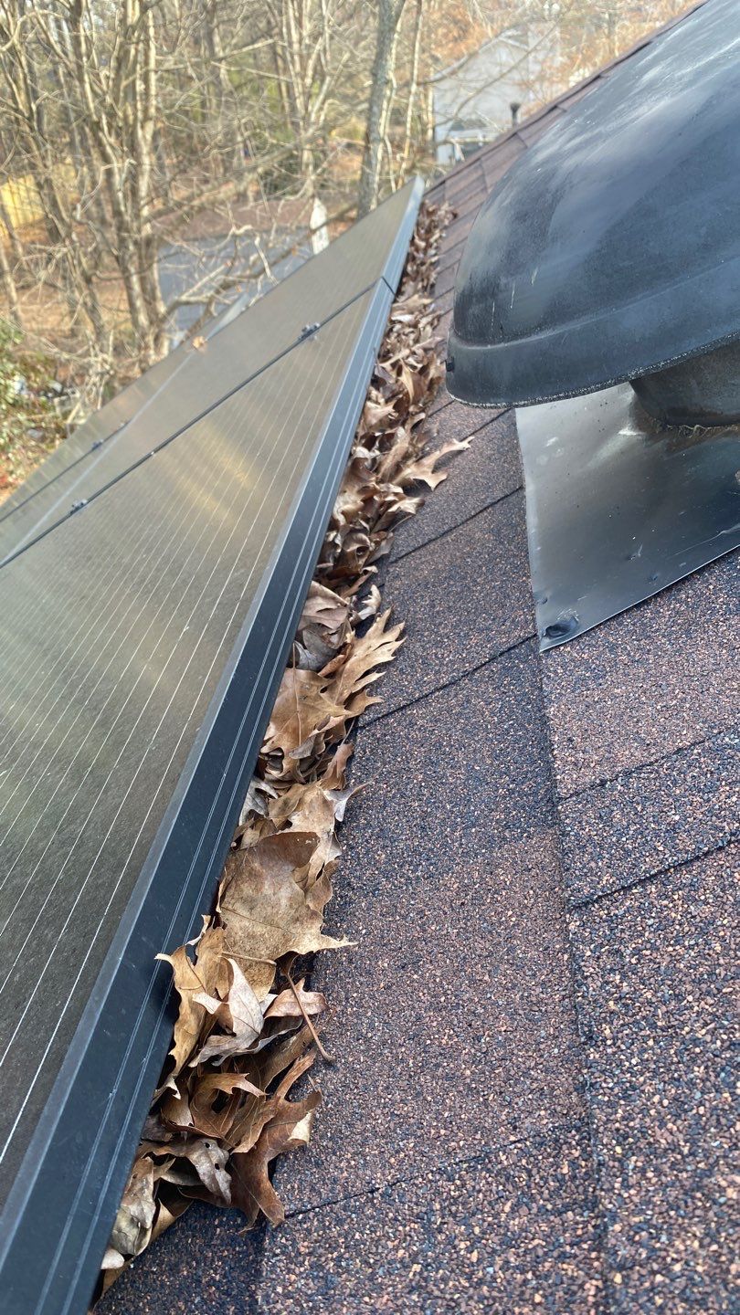 Cleaning Gutters  by Deerfield Roofing LLC