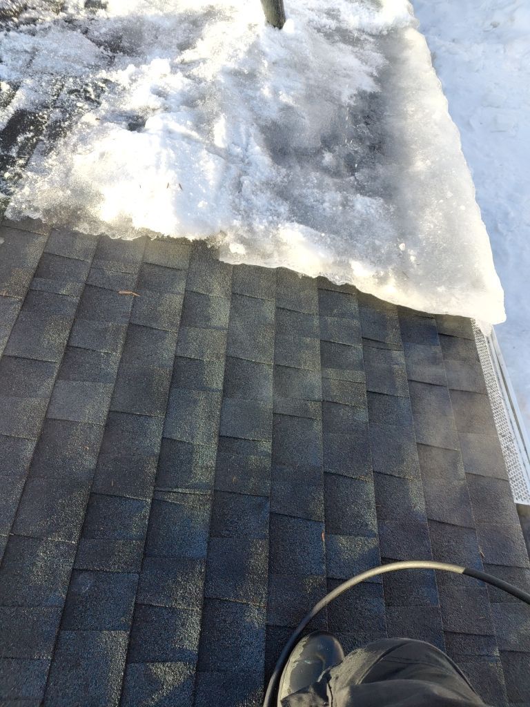 Steaming and Installing New Covers and Heating Cable by Next Level Seamless Gutters / Exteriors Inc.