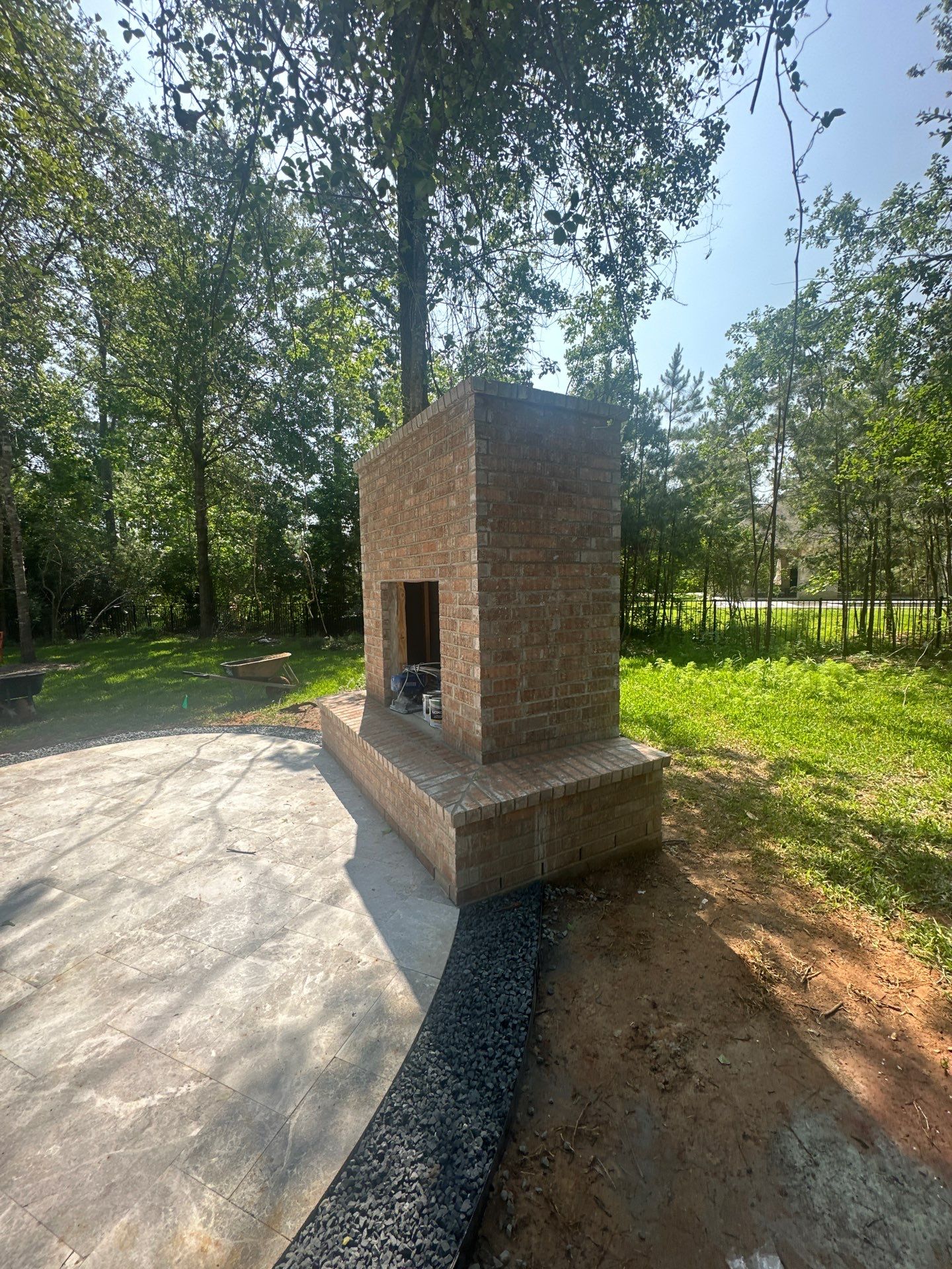 Outdoor Fireplace in Tomball, TX by SophAlx LLC