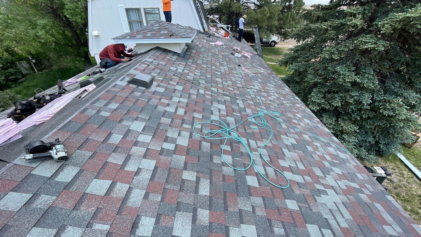 Architectural Shingle Roof Replacement with gutters and downspouts for Edgewood Home by Doyle Roof Masters Inc