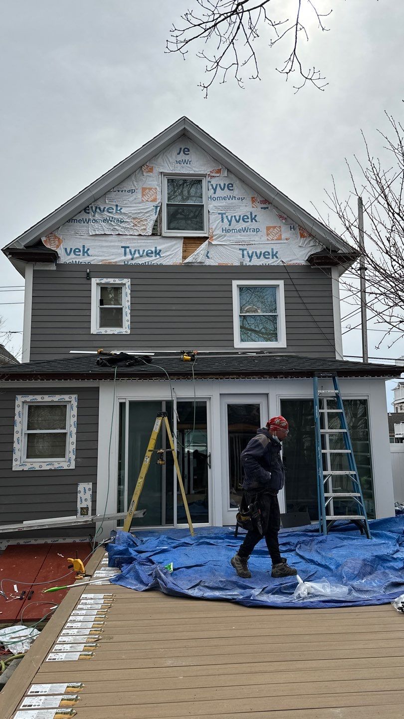 Siding Installation using Hardie Plank Aged Pewter by A Plus Exterior