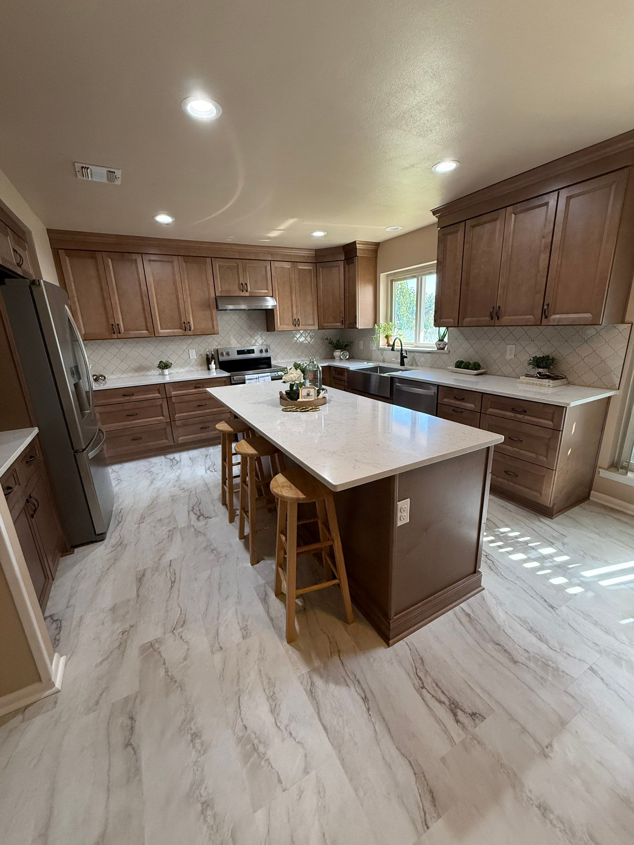 Windcrest Kitchen Remodel Peninsula to Island Before and After by Legacy Bath and Kitchen 