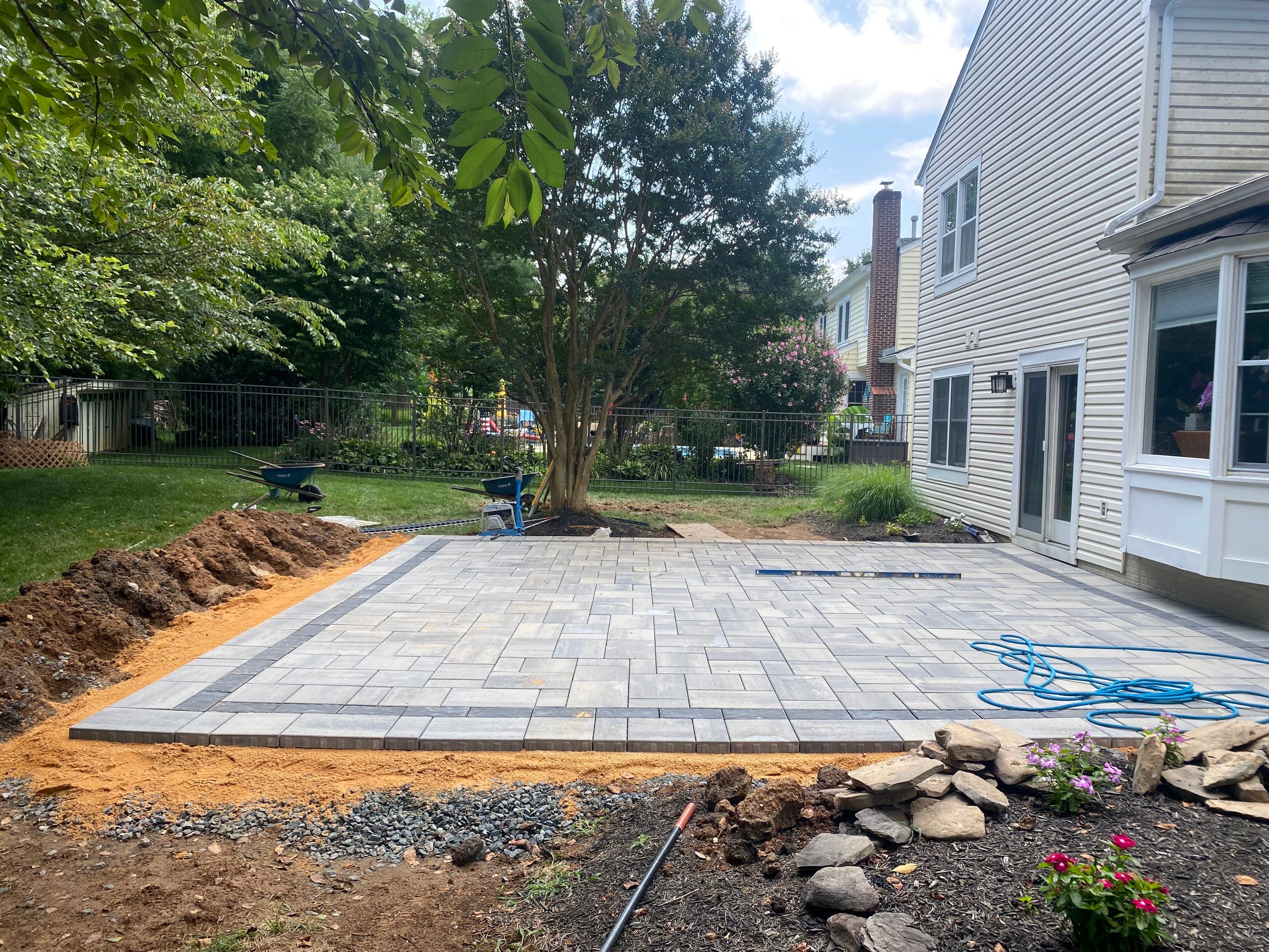 Backyard Transformation using Techo-Bloc Pavers by The Smet Companies, LLC