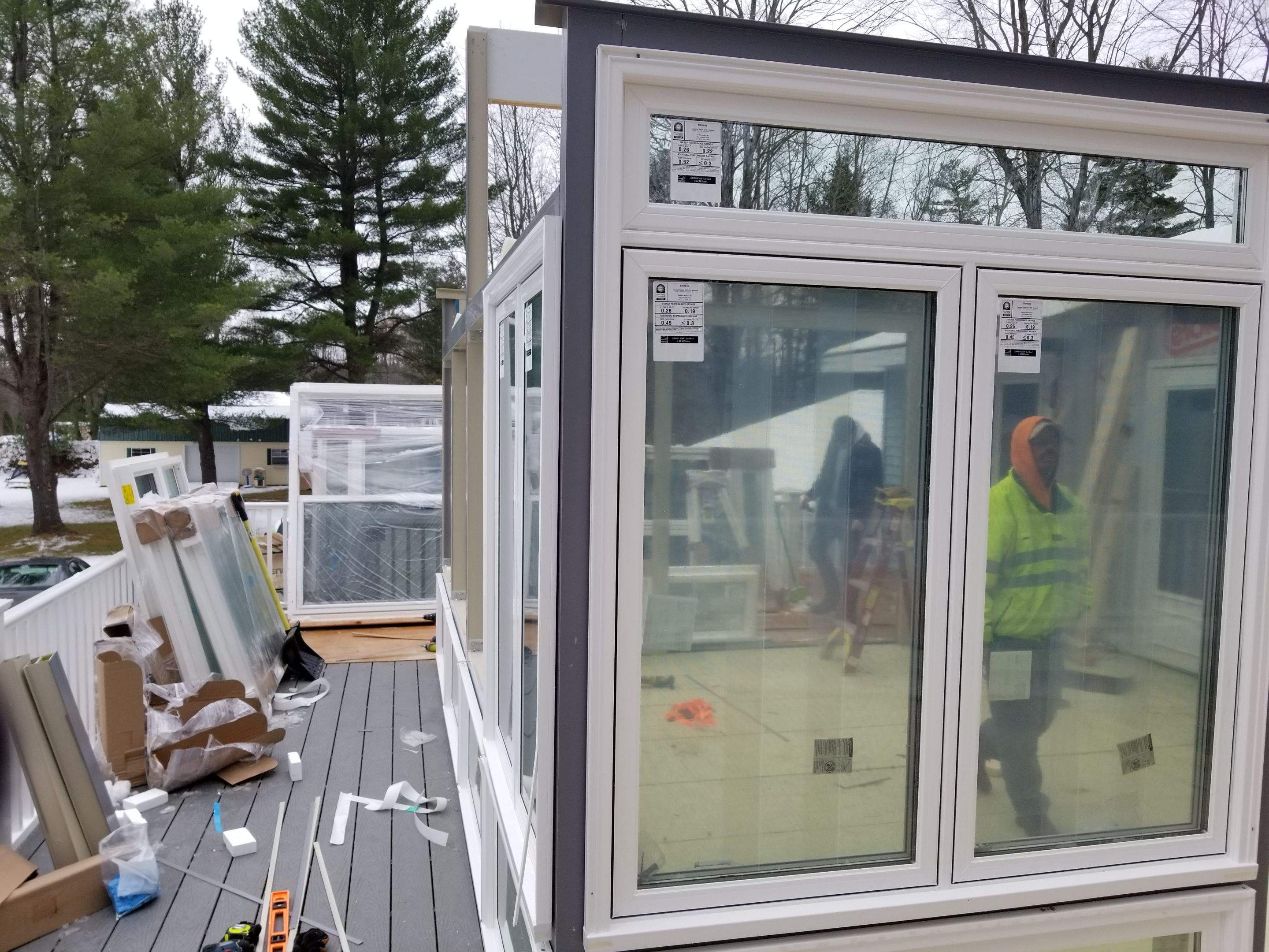 Sunroom and deck addition. by Energy Plus Home Improvements