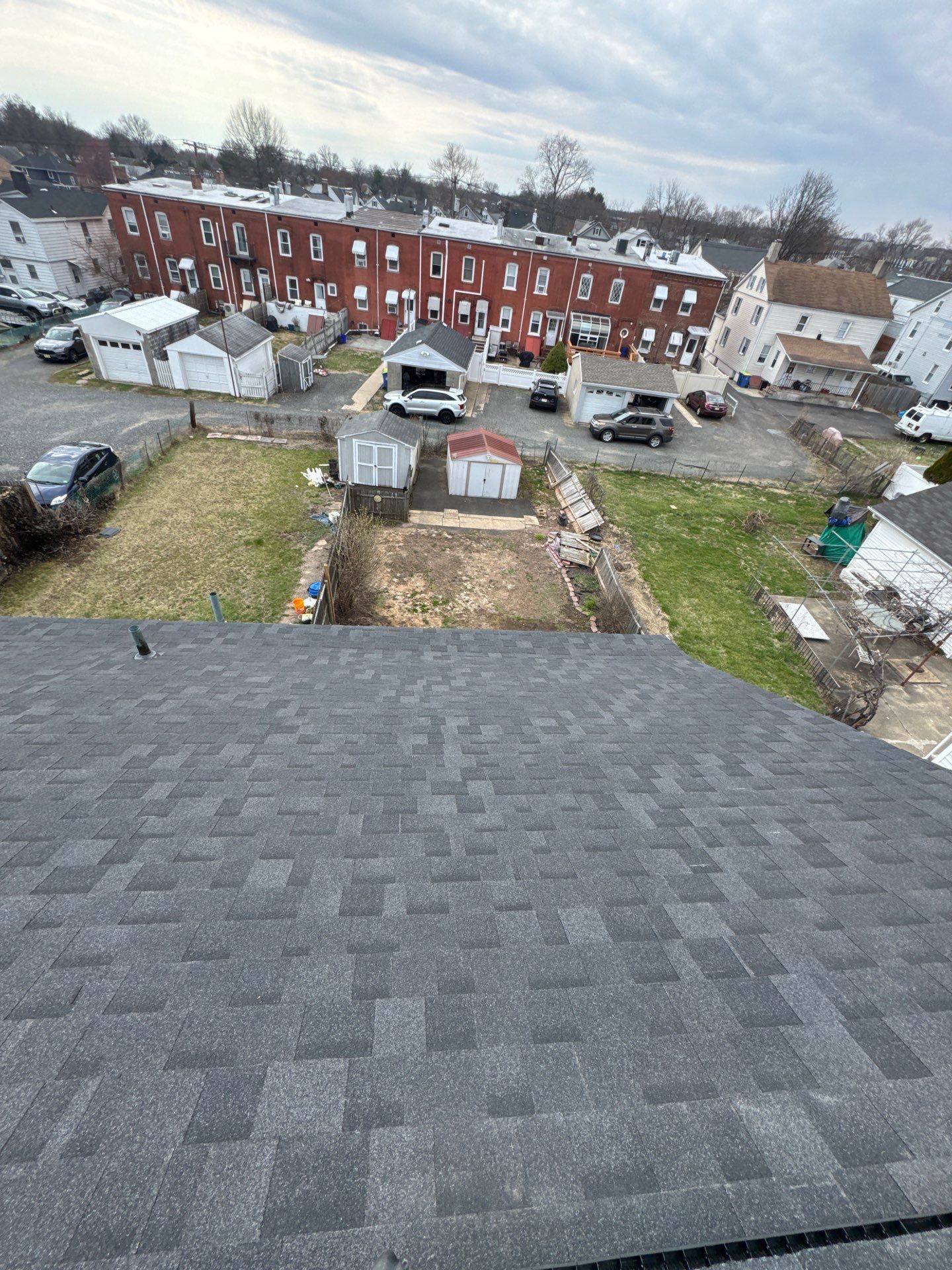 Onyx Black Shingles by Reimagine Roofing