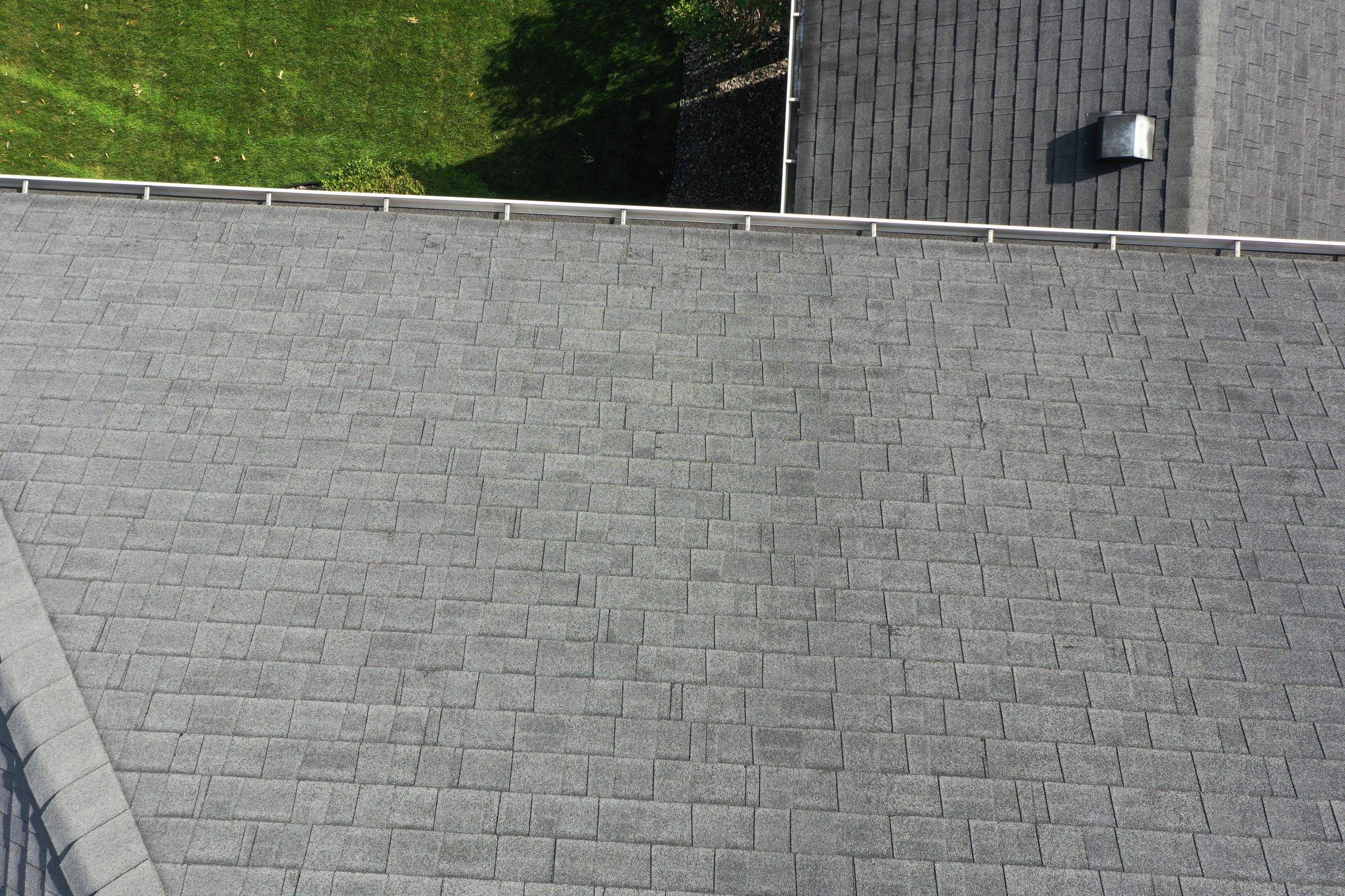 Residential Roofing Installation using Certainteed Landmark Moire Black by MODERN EXTERIOR SYSTEMS