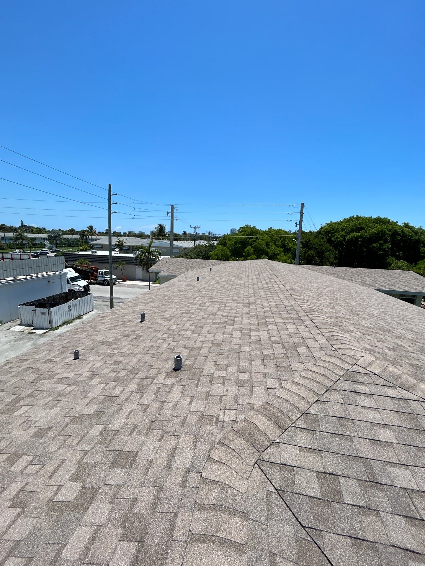 Commercial Roofing Installation using CERTAINTEED LANDMARK AR (SUNRISE CEDAR) by Earl W. Johnston Roofing 