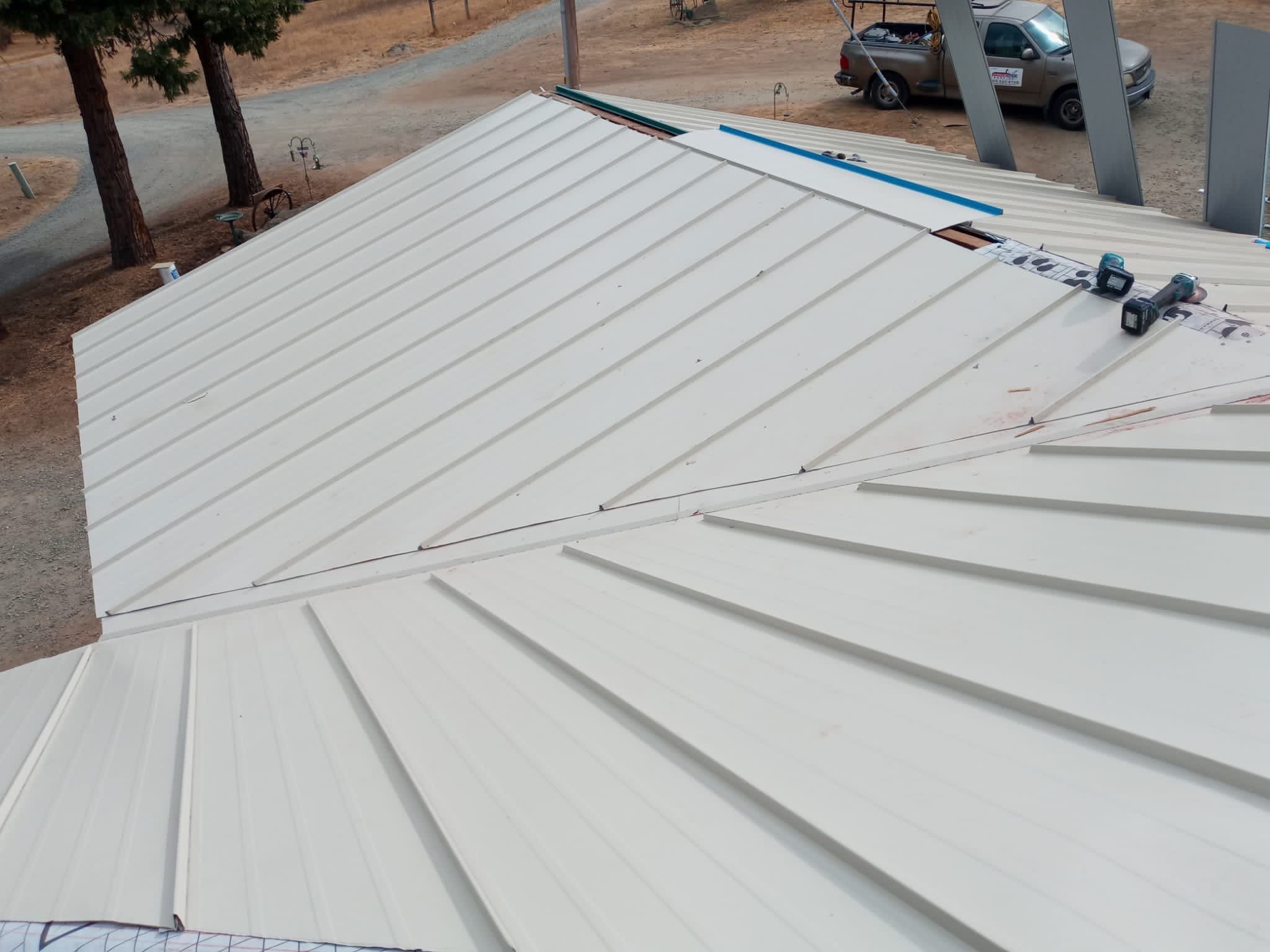 Residential Roofing Installation using Standing seam metal roofing system by Straight Edge Roofing Inc
