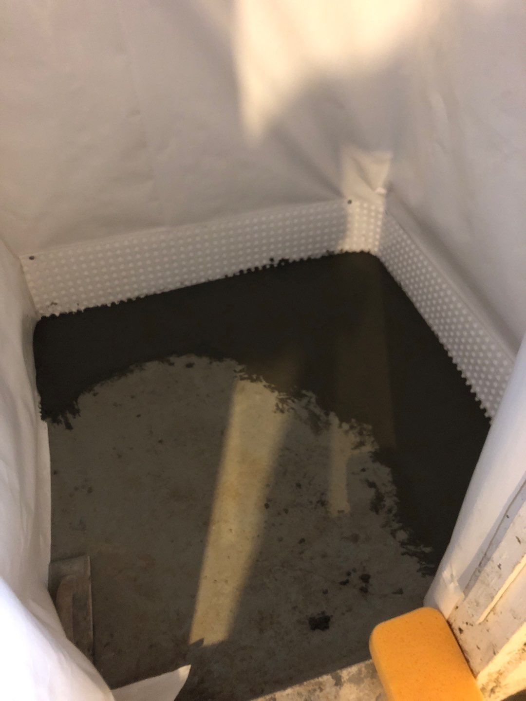 Basement Waterproofing using Drain tile system and a foundation wrap by ACE Waterproofing & Basement Solutions