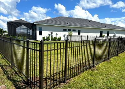 Aluminum Fence Installation using 4Ft Bronze 3 Rail Aluminum Fence