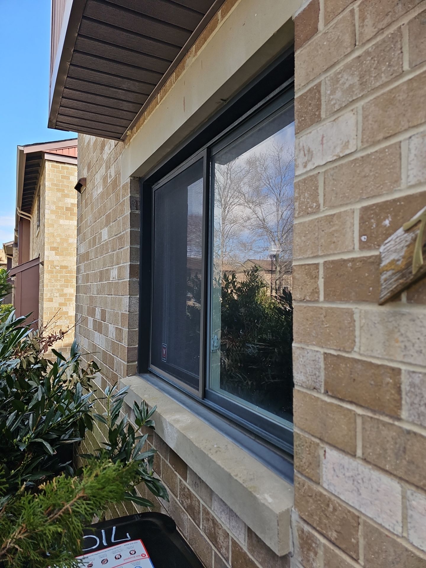 Bronze exterior Provia Sliding windows by Window Depot of Annapolis