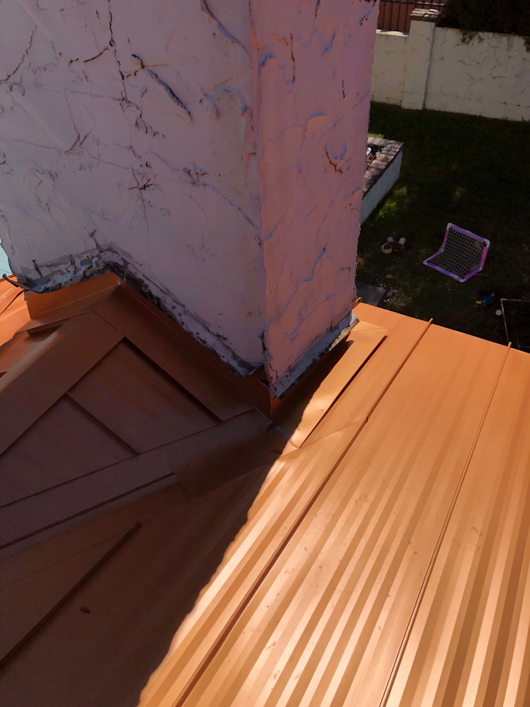 Residential Re-Roof using MS Metals, Copper Penny, Standing Seam. by First Due Roofing
