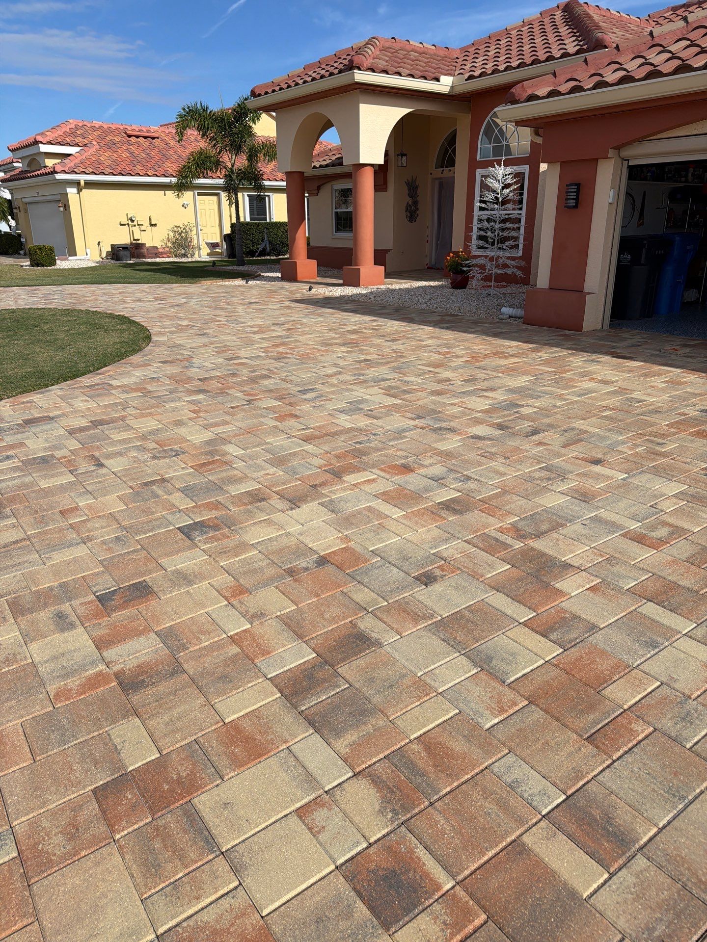 Professional Paver Sealing for this beautiful Driveway in Sun City Center by Supreme Paver Experts