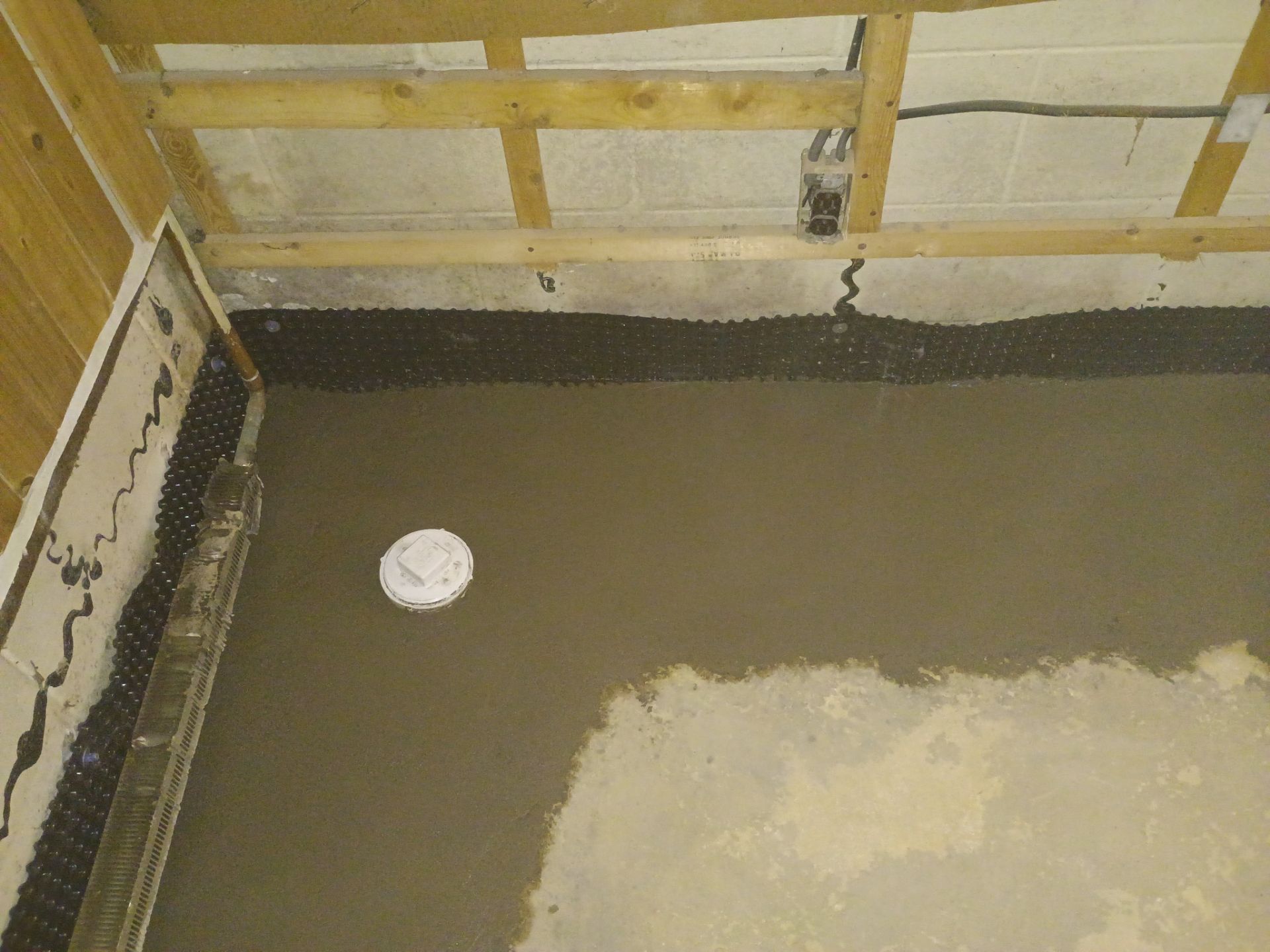 Drain Tile, Sump Pump & Buried Discharge in Columbia Heights by Waterproofing Northeast