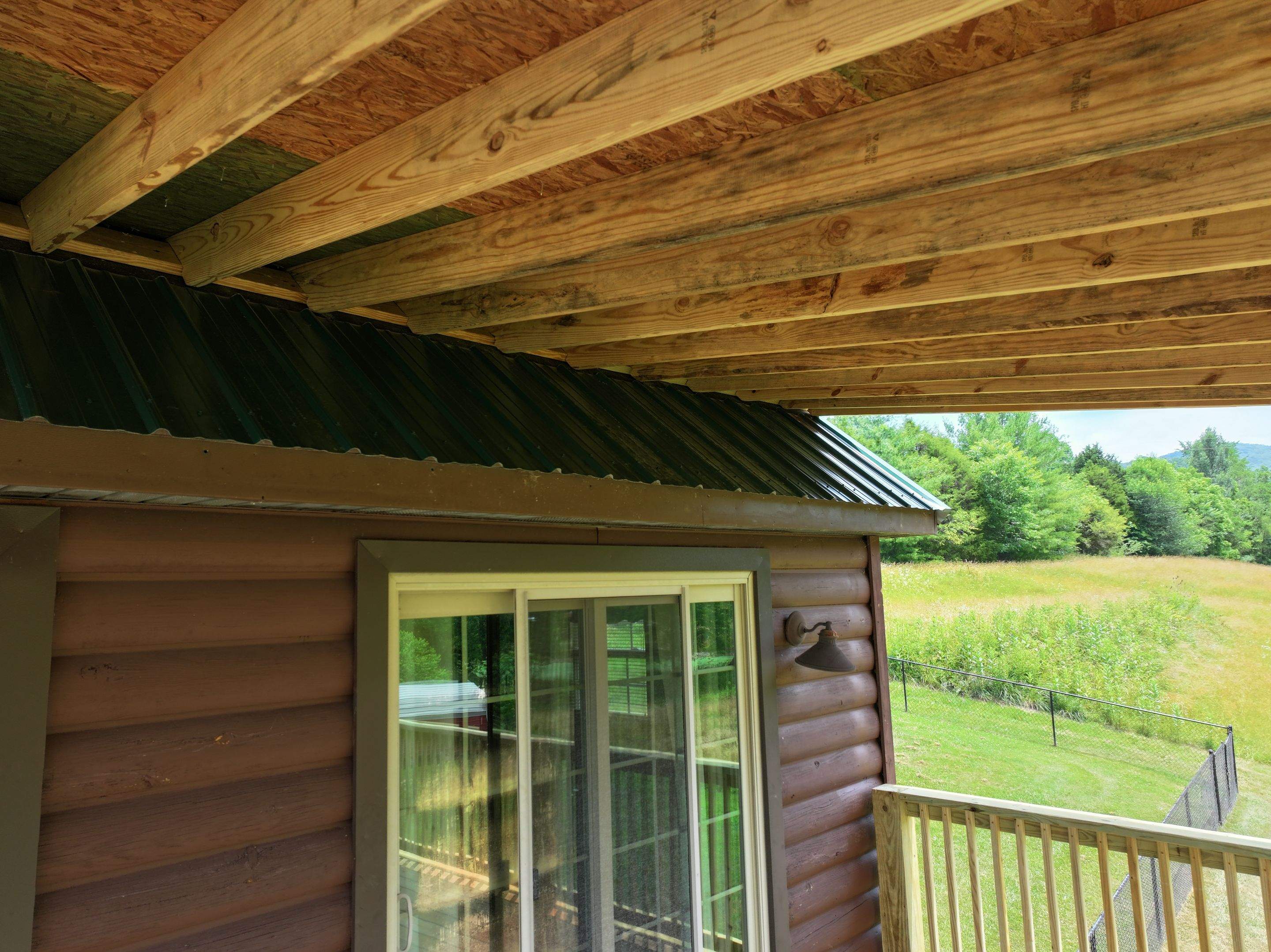 Paddle Creek Pet Ranch Cabin  by Omnia Roofing