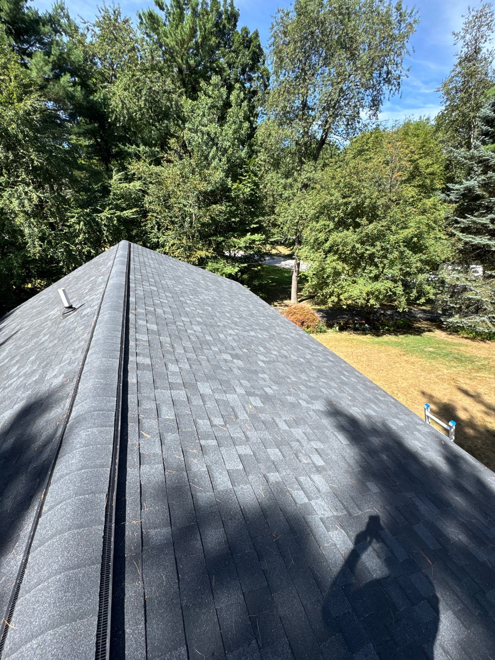 Roof Replacement in Stratham, NH - OC Onyx Black w/ Black Drip Edge by Compass exteriors