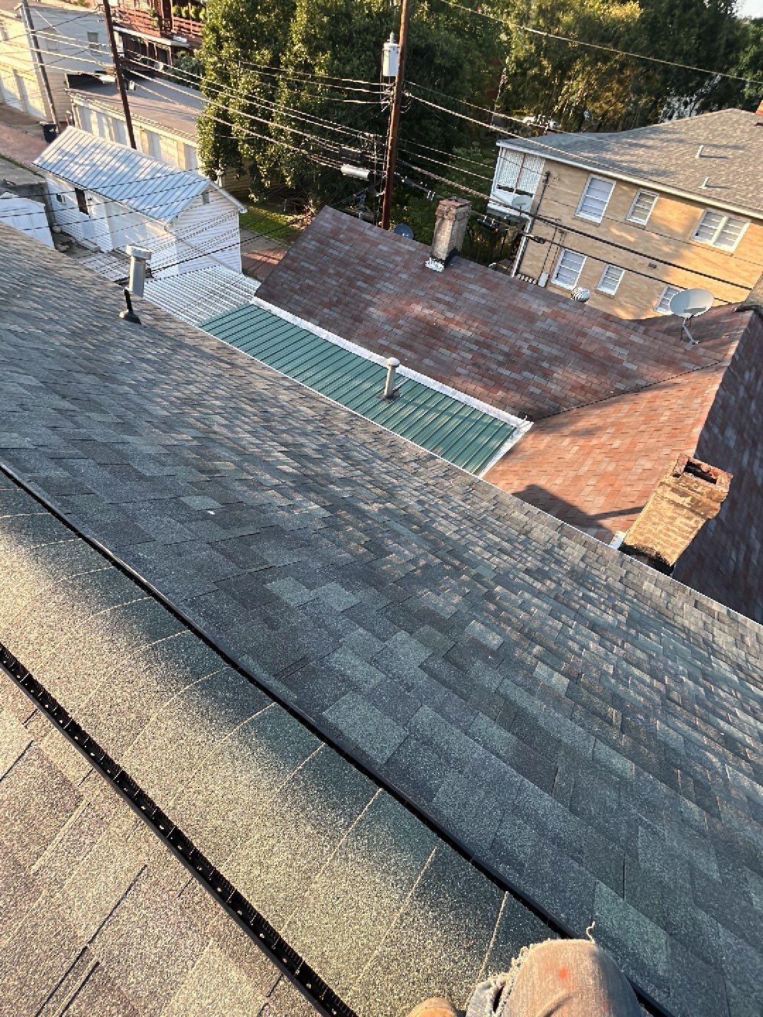 Residential Roofing Installation using Performance Shingles by Mr. Roofer